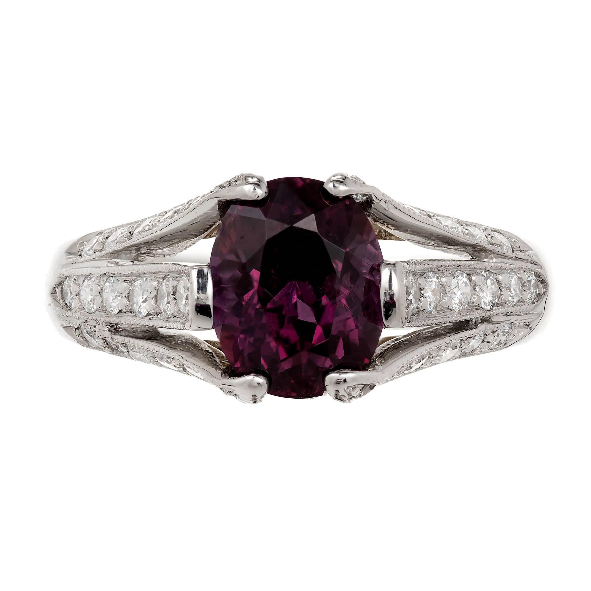 Richard Krementz color change Garnet ring, GIA certified natural blue to purple Garnet in a beautiful Diamond Pavé Platinum and 18k gold ring. Richard Krementz is famous for using the world’s finest colored gemstones in top quality settings. This is