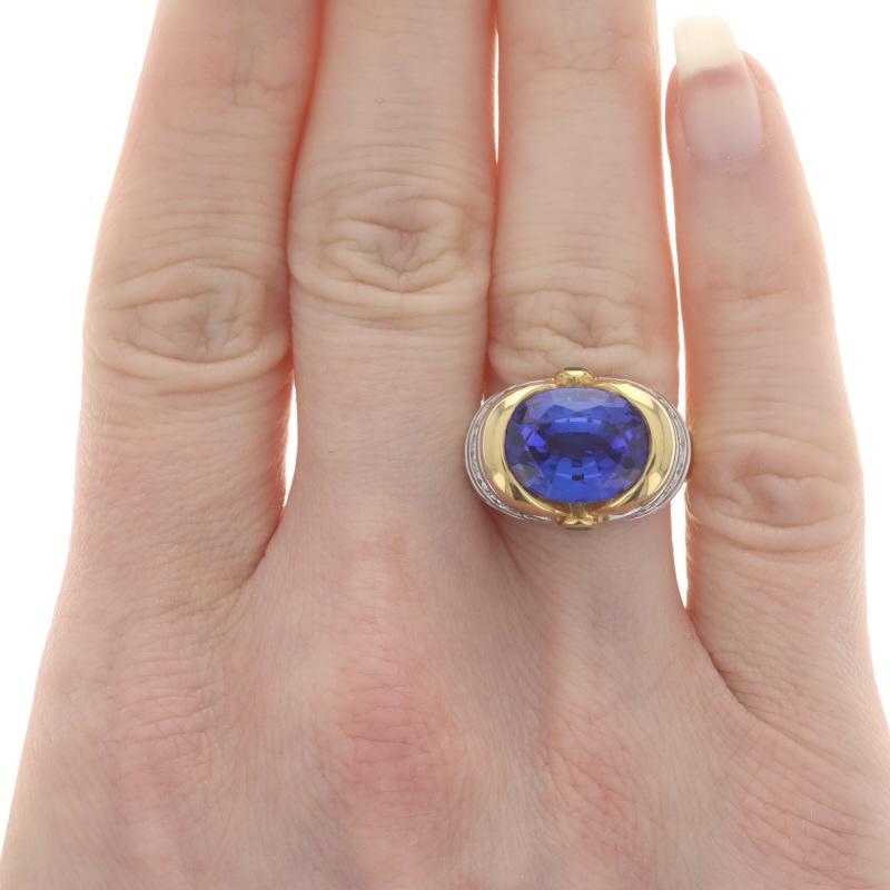 Size: 6 1/2
Please contact us for a resizing quote.

Brand: Richard Krementz

Metal Content: 18k Yellow Gold & Platinum

Stone Information
Natural Tanzanite
Treatment: Routinely Enhanced
Carat(s): 8.57ct
Cut: Oval
Color: Purple

Natural