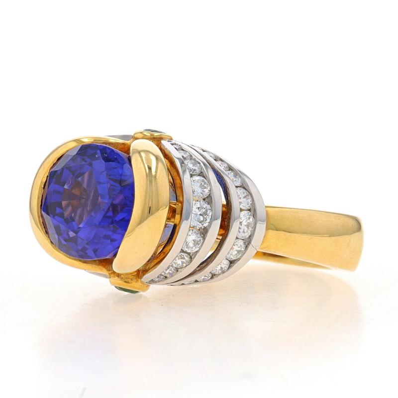 Taille ovale Richard Krementz Bague en or jaune 18 carats platine grenat, tanzanite et diamant 9,59 carats poids total en vente