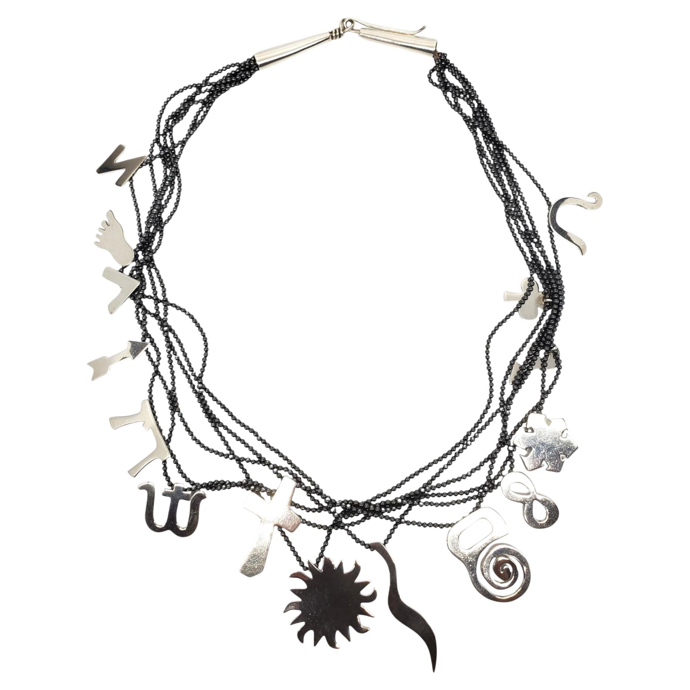 A. Richard Lindsay - Collana con ciondolo multi charme in perline d'argento #22736 in vendita