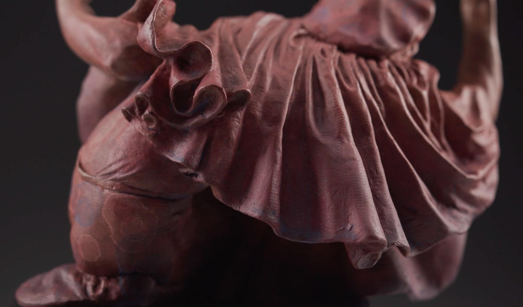 A richly flowing cape drapes his shoulders, as he crouches low, eyes looking upward, “Jacques” raises his hands to test the confining walls of his imaginary box. “Jacques” reminds us that many of our limitations are self-imposed boundaries, and we