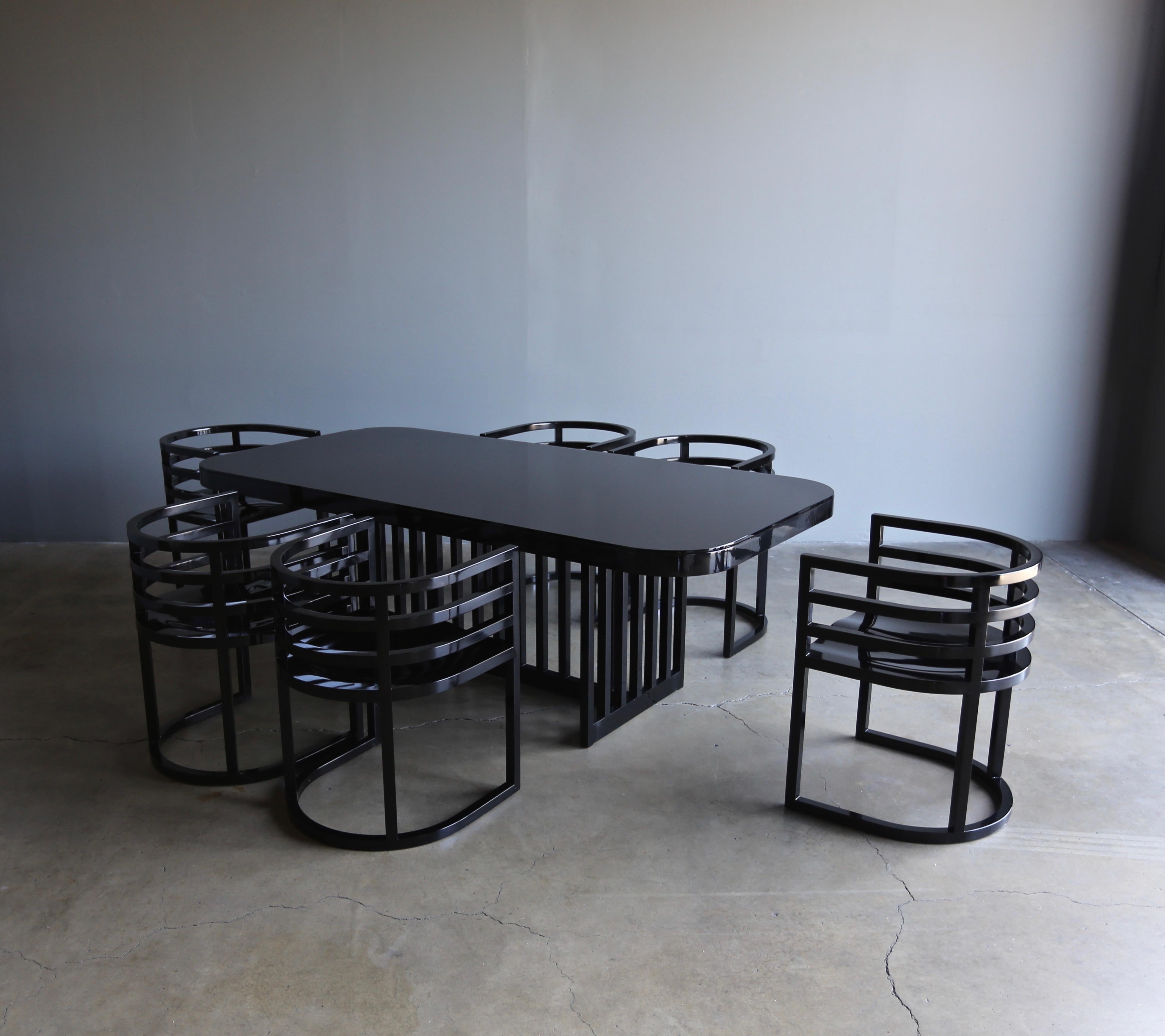 Richard Meier dining table and six chairs, circa 1982. Impressed signature to underside of the dining table and each chair. 

Each chair measures: 21