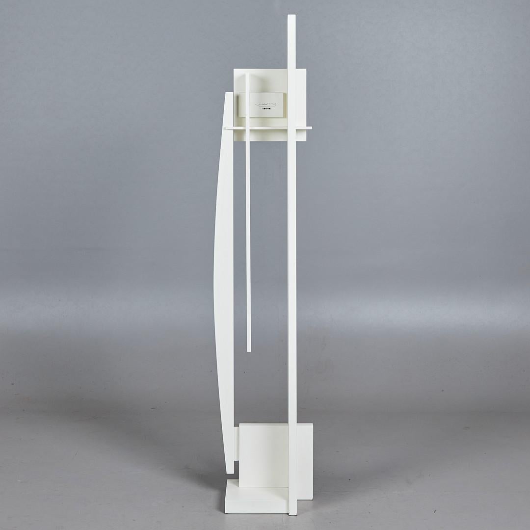 Designed in 1996 for Acerbis International, Italy, white lacquered wood, quartz clock with precision mechanism, height 195 cm, 35 x 35 cm
Prototype of a small series of only a few examples, produced from 1996 to 2003. 

