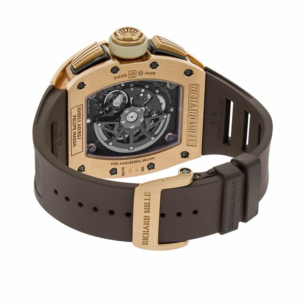 Richard Mille RM 011 Reference #:RM011. Richard Mille Felipe Massa Ivory Flyback Chronograph in 18 kt. Rose Gold. The alluring Tonneau shape watch measures 50 mm by 40 mm. Sapphire crystals on the front and back reveal the Richard Mille in-house