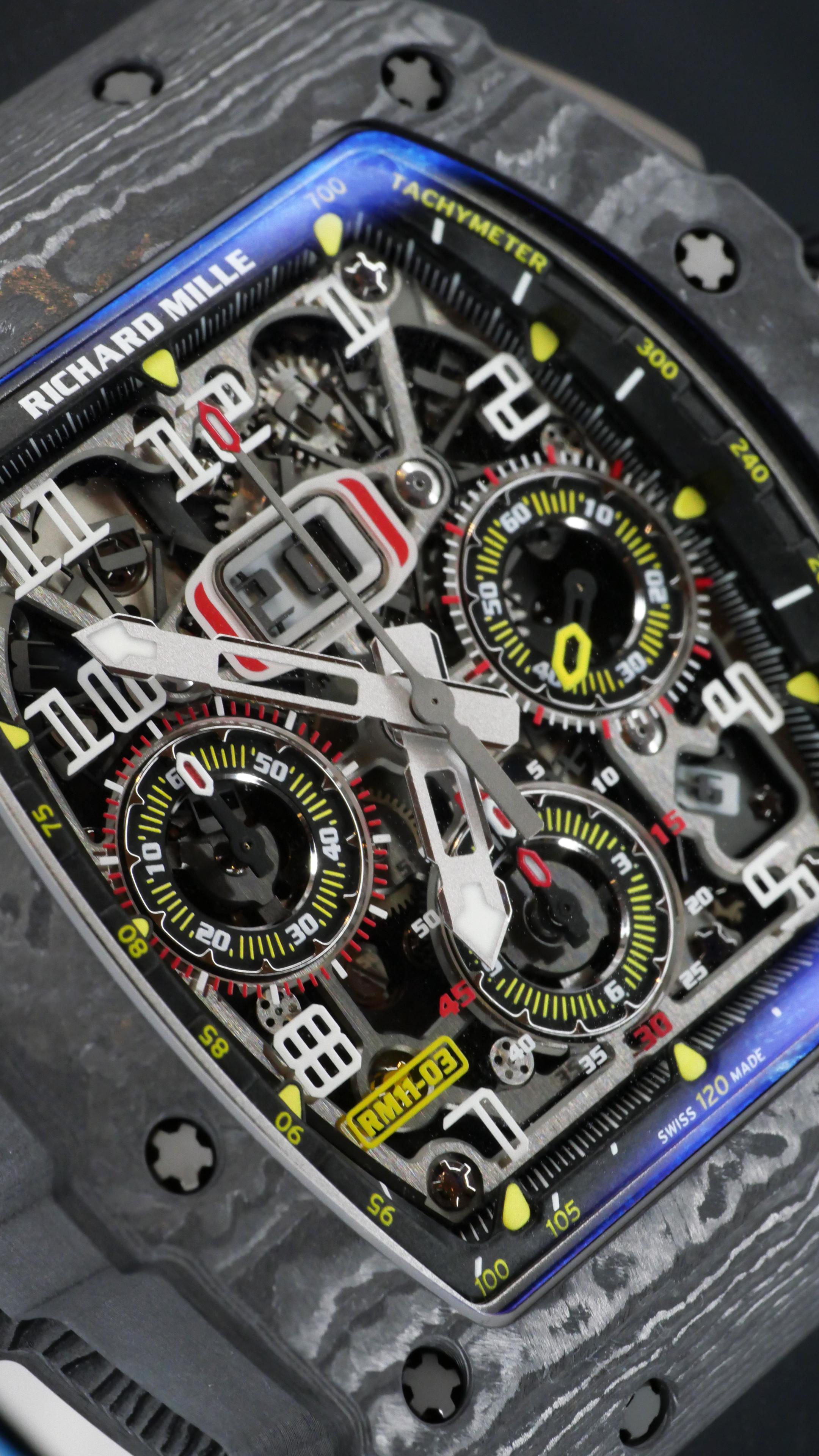 The design and execution of the RM 11-03 demonstrates a complete conceptual approach to the movement, case and dial.

The RM 011’s case is typical of Richard Mille: a tonneau shape with a curved bezel, sides and caseback. The watch is driven by a