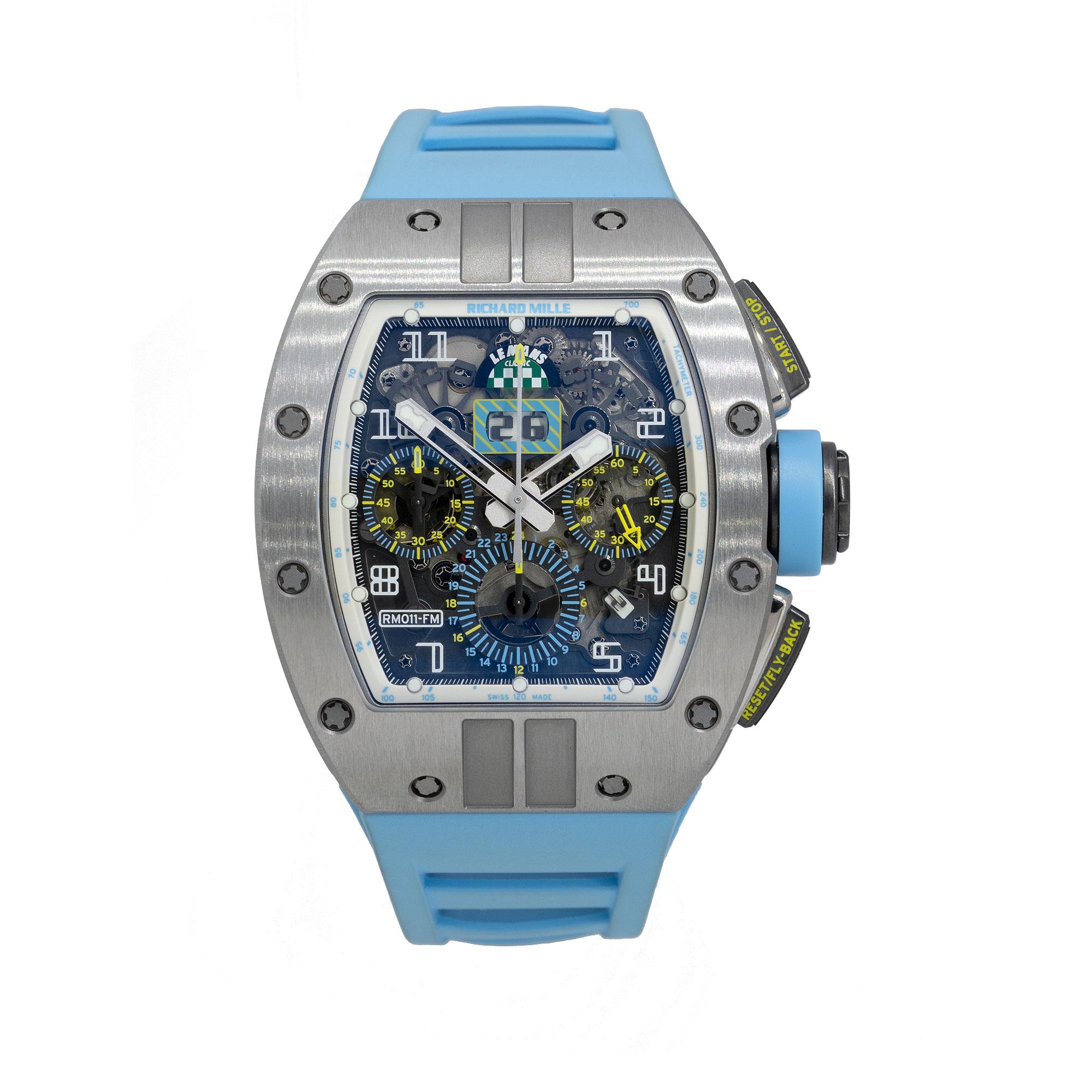 Brand: Richard Mille
MPN: RM 011
Model: LeMans Classic
Case Material: Titanium
Case Diameter: 40mm
Crystal: Sapphire Crystal
Bezel: Titanium
Dial: Skeleton chronographic dial
Bracelet: Baby blue rubber bracelet
Size: Adjustable
Clasp: Two piece