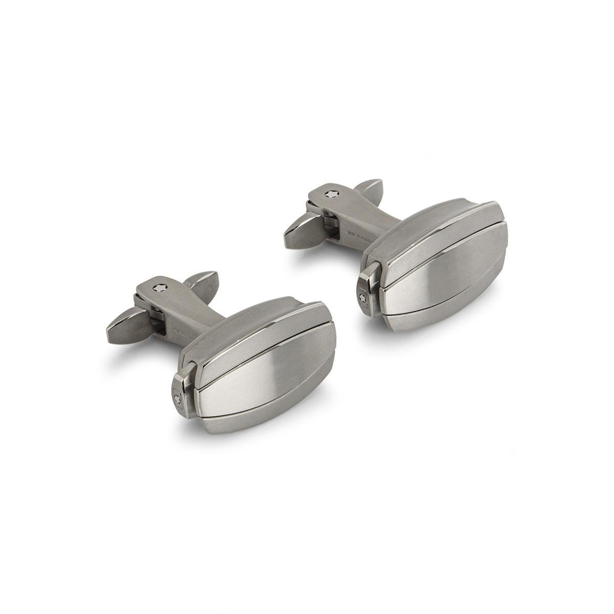 A pair of cufflinks by Richard Mille. Made from grade 5 titanium, the cufflinks have a satin-brushed finish, complemented by a hand bevelled edge. Featuring a patented mechanism that opens the bars using the push buttons on either side, once in