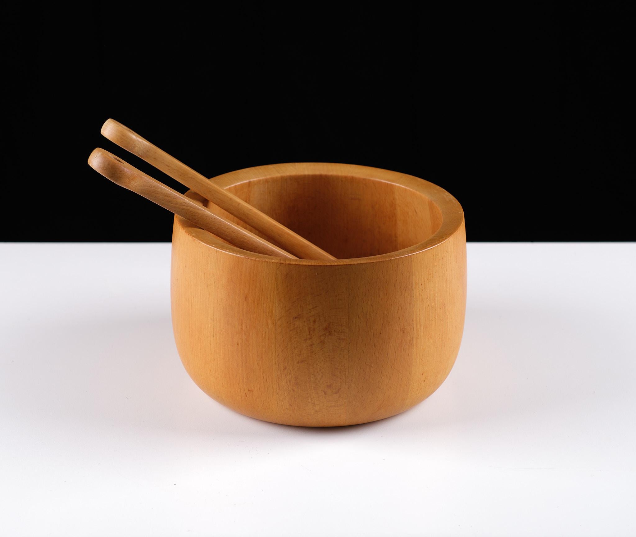 Very nice solid teak bowl by Richard Nissen, Denmark. It was designed and manufactured in the early 1960s. The bowl comes with a salad serving set also from Nissen. Its very rare to find a full set. signed .

