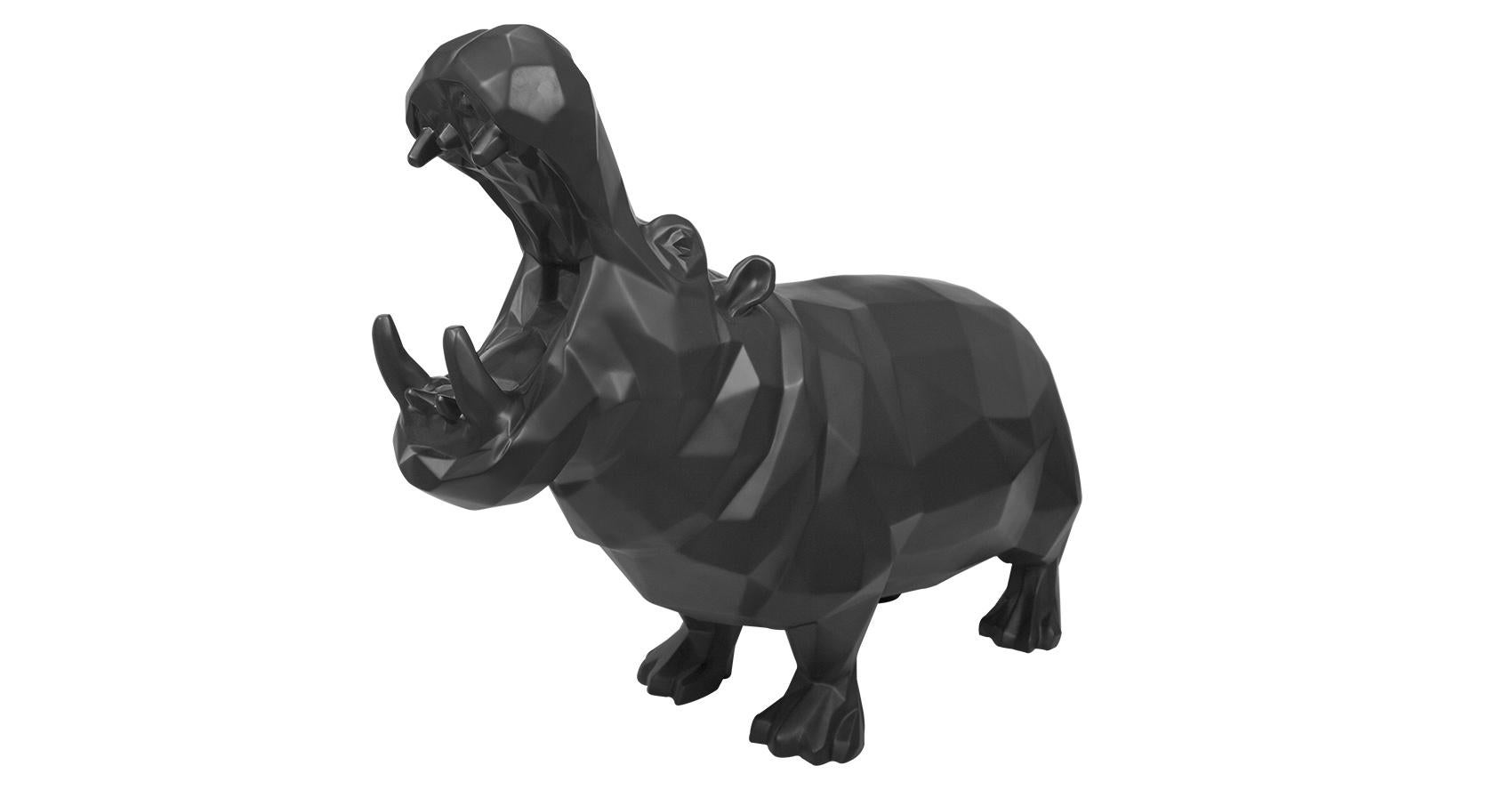 Richard Orlinski – "Hippopotamus" (Matt Black)
Medium: Resin
Dimensions: 41 x 55 x 23 cm
Color: Matt Black
Condition: Excellent
A Sculpture of Strength, Duality, and Energy

Richard Orlinski’s "Hippopotamus" captures the fascinating contrast between