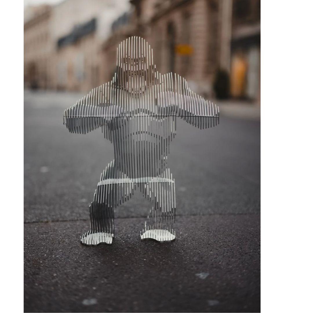 WILD KONG Is a signature Richard Orlinski piece. It declares itself invincible with its open mouth and fearsome teeth as it beats its chest with mighty fists. But the ferocious beast is also capable of tenderness. The piece sees the sculptor draw