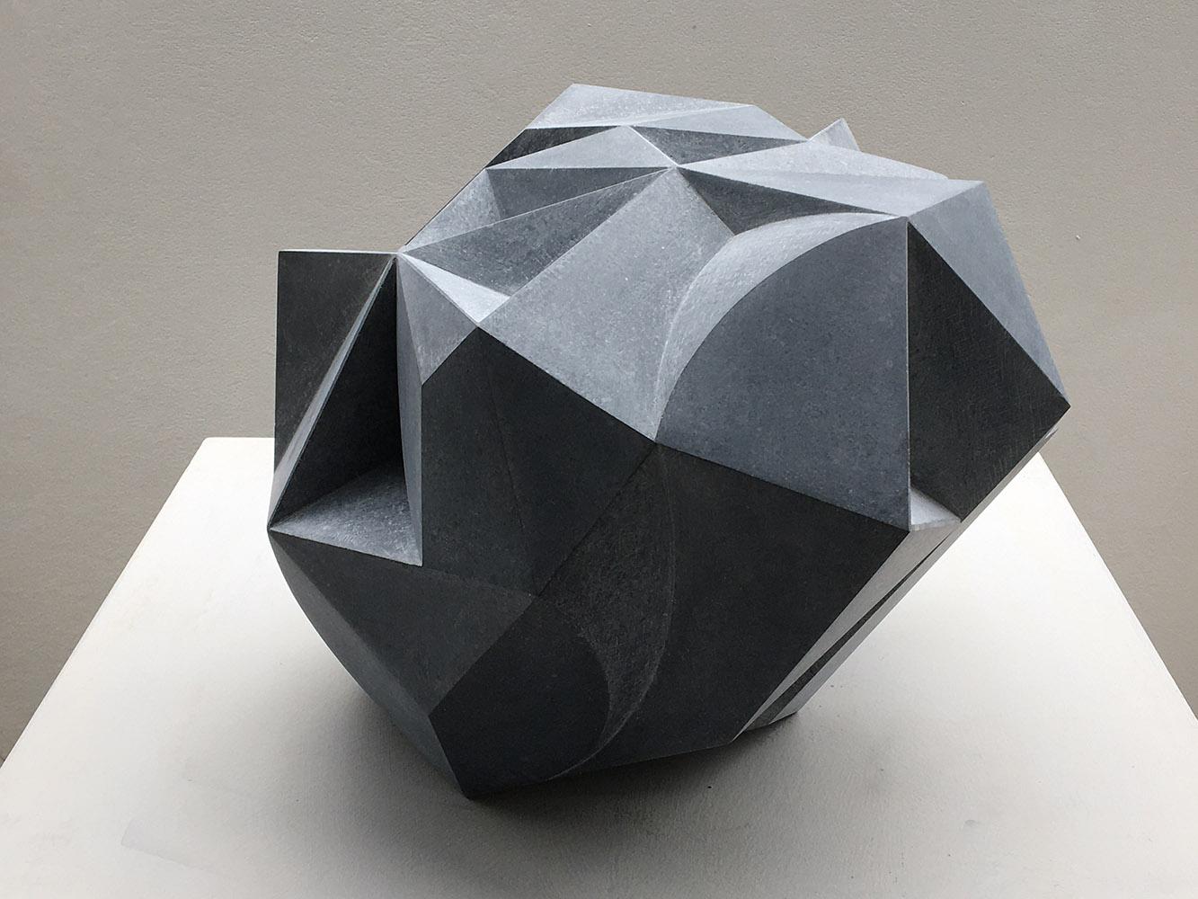 Caniform is a unique Irish blue limestone sculpture by contemporary artist Richard Perry, dimensions are 26 × 37 × 37 cm (10.2 × 14.6 × 14.6 in). 
The sculpture is signed and comes with a certificate of authenticity.

This sculpture is a good