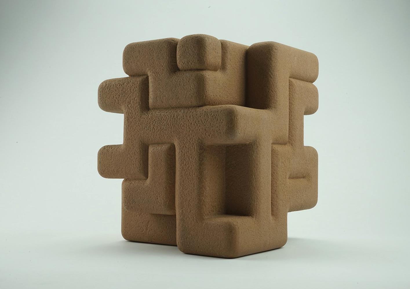 Six sides to a cube by British artist Richard Perry (b. 1960).
Unique work. Mansfield red sandstone sculpture, 26 cm × 22 cm × 22 cm // 10.24 x 8.66 x 8.66 in.
This piece is typical of the geometric language the sculptor developed in the 2010s
