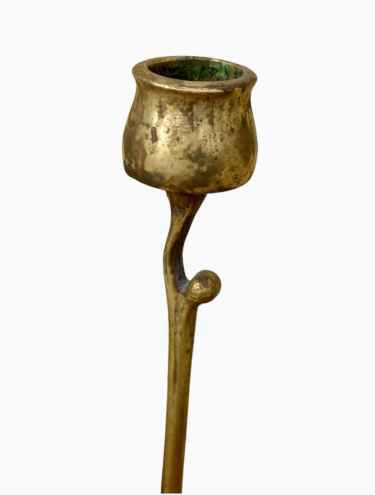 Gilded bronze candlestick forming a flower stem ending in a bud. This candlestick model is among Riemerschmid's first creations in the field of Decorative Arts, but also among the first most representative manifestations of Judendstil, Munich Art