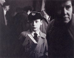 Young Lad ( haunting portrait of young boy on a crowded London street)