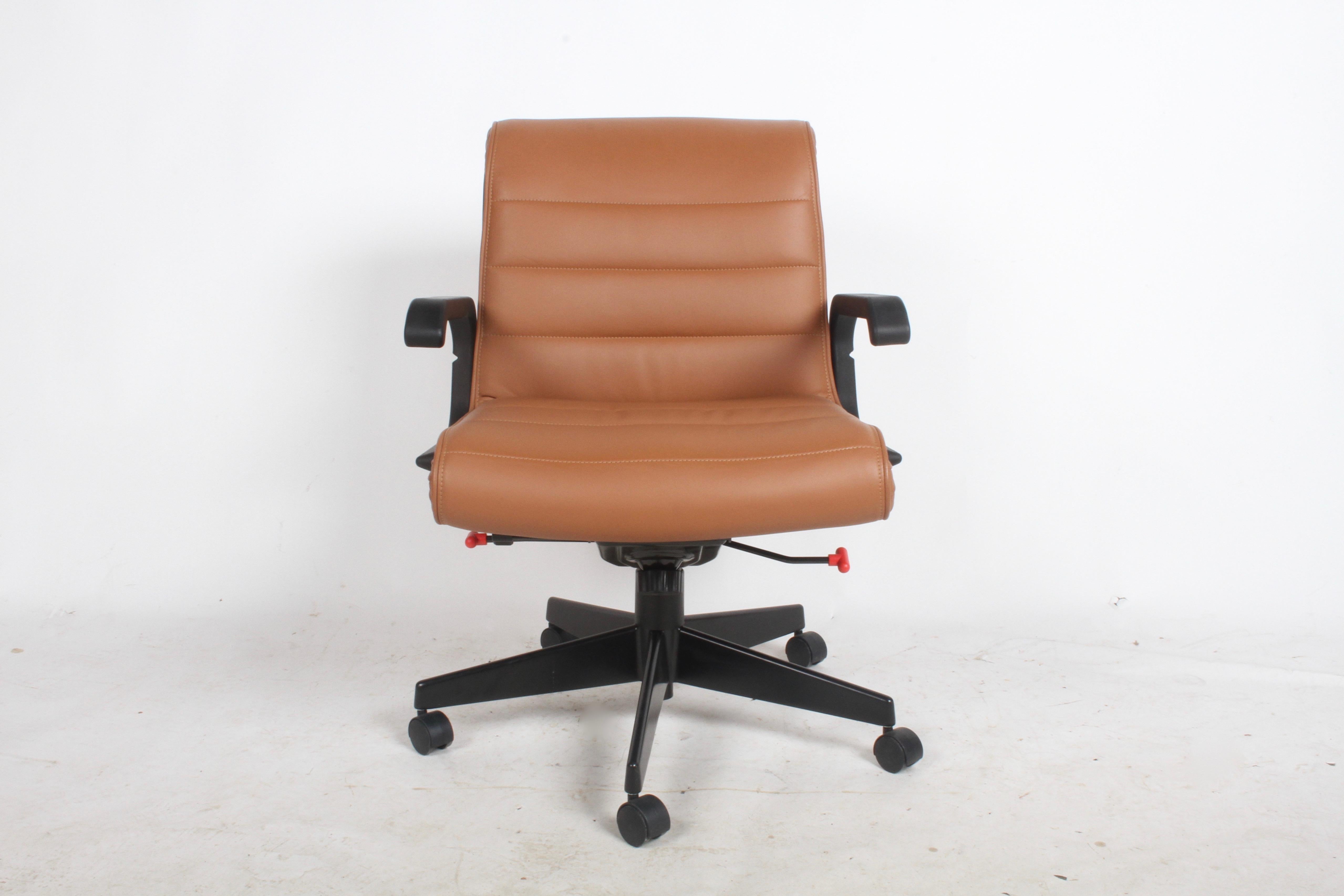 Designer Richard Sapper for Knoll the desk chairs in tan Spinneybeck leather, fully adjustable on 5 star bases on casters. Production in the mid 2000s, this chair is no longer in production. Over in nice used condition, condition varies on each