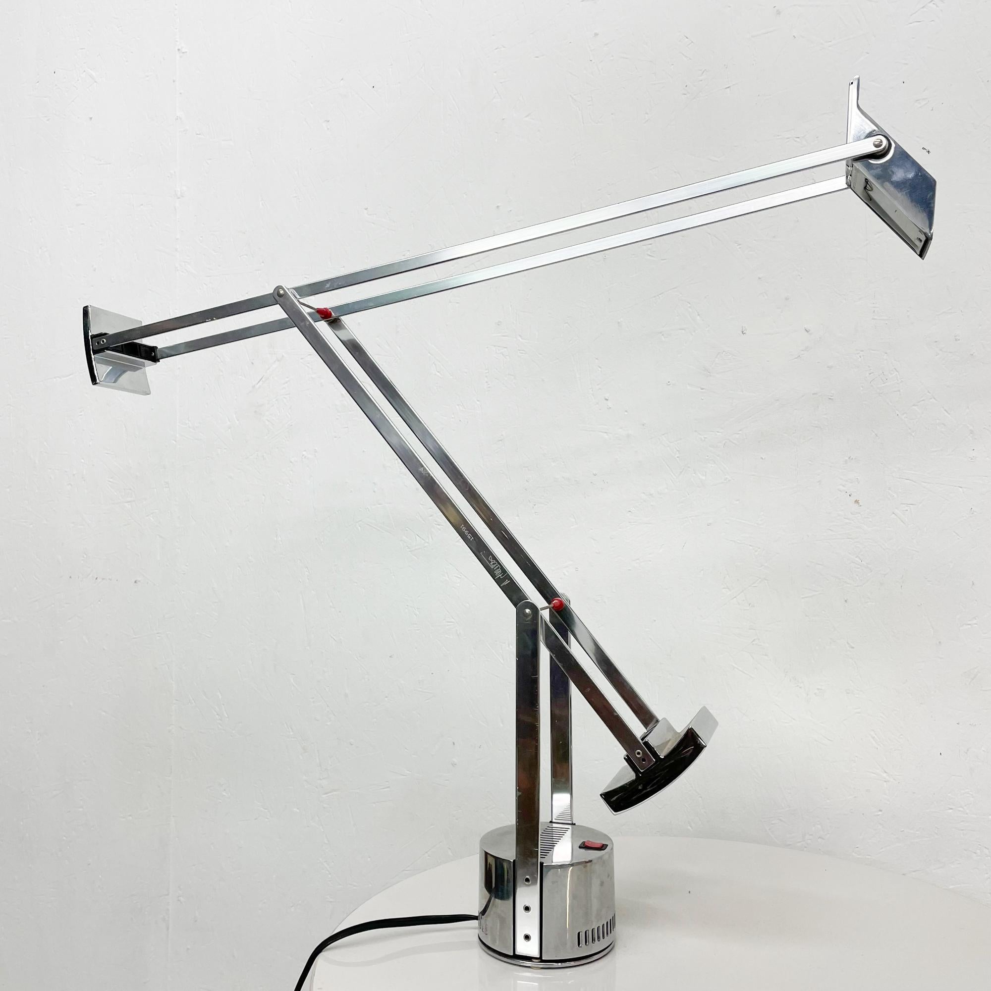 Table Lamp
Very rare in Chrome plate award winning Tizio model table lamp made in Italy 1980s. 
Designed in 1972 by Richard Sapper for Artemide.
Provides form and function. Lamp is lightweight and adjustable offering direct and concentrated