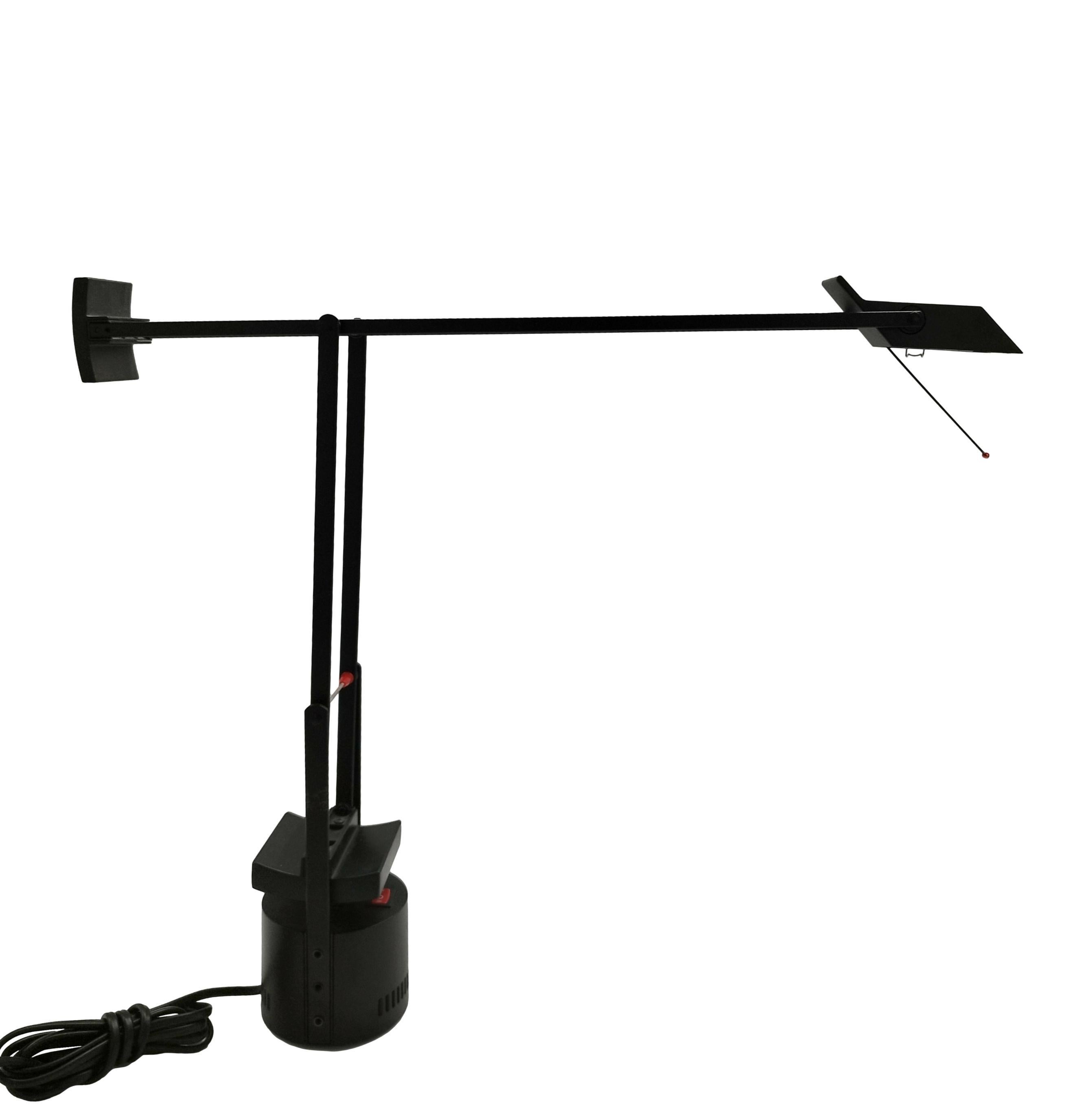 This table lamp, model Tizio, was designed by Richard Sapper for Artemide, in Italy, in 1972. The lamp is built with two counterweights allowing the user to direct the light at will.
The lamp adjusts with a pull or push of the hand and stays in