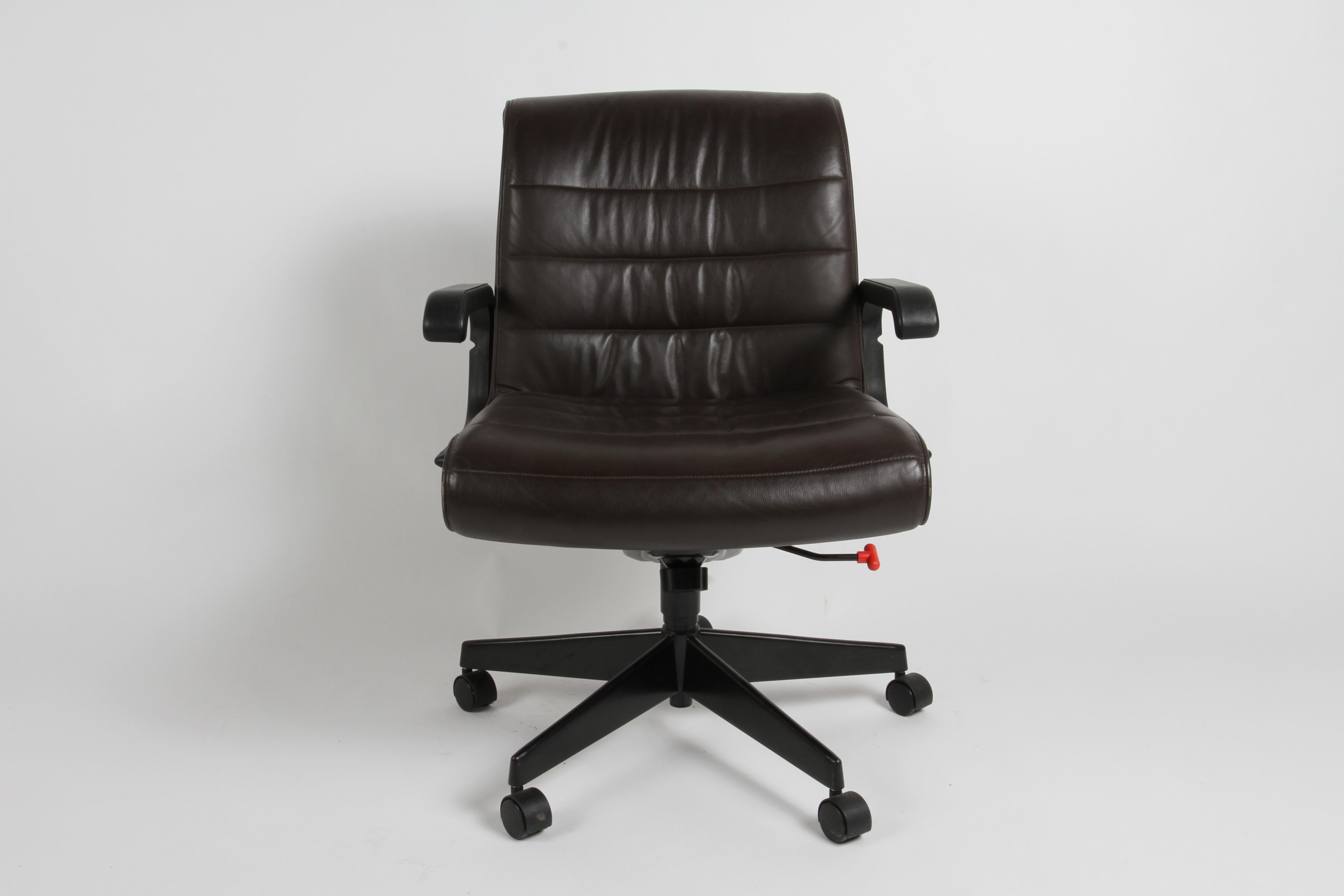 Designer Richard Sapper for Knoll the desk chairs in rich dark brown Spinneybeck leather, fully adjustable on 5 star bases on casters. Production in the 2001, this chair is no longer in production. Over in nice used condition, no rips or major wear