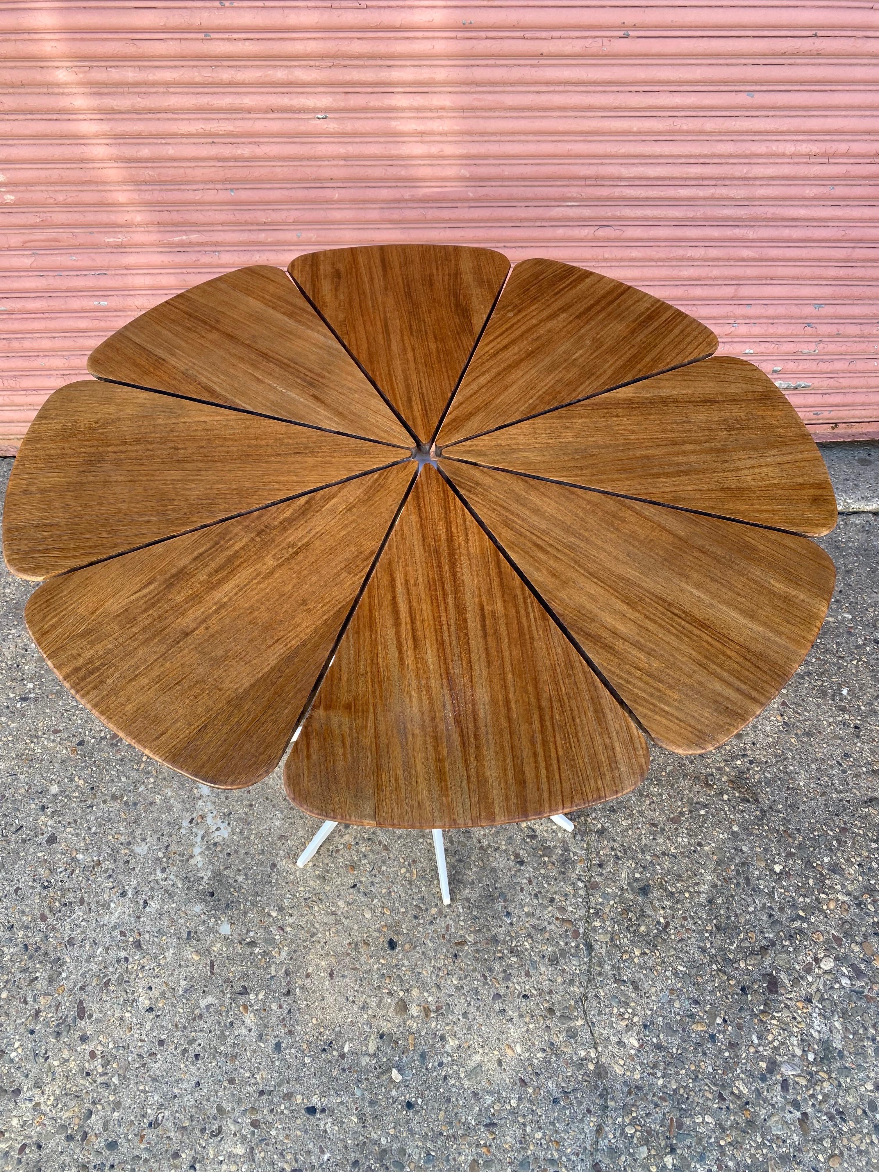 Richard Schultz for Knoll Petal Table.  1960's design, but this model dates to only a few years old.  In nice shape with just a little paint loss showing on the bottom of the pole above the base.