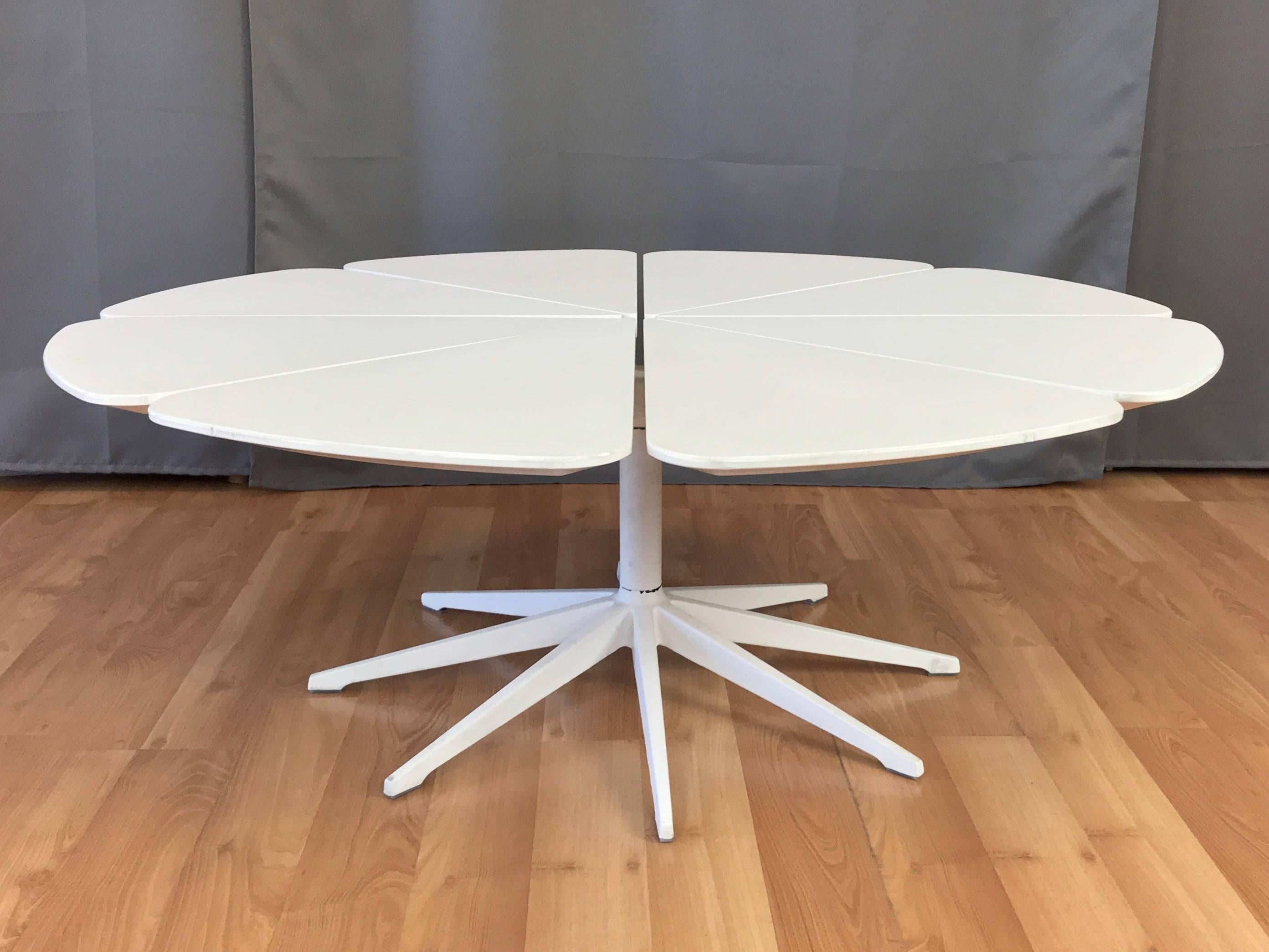 A Knoll Petal coffee table by Richard Schultz with outdoor-rated white high density polyurethane top.

Designed in 1960 to accompany Knoll’s Bertoia chairs, this example of the design icon was produced in the early 2000s. Inspired by Queen Anne’s