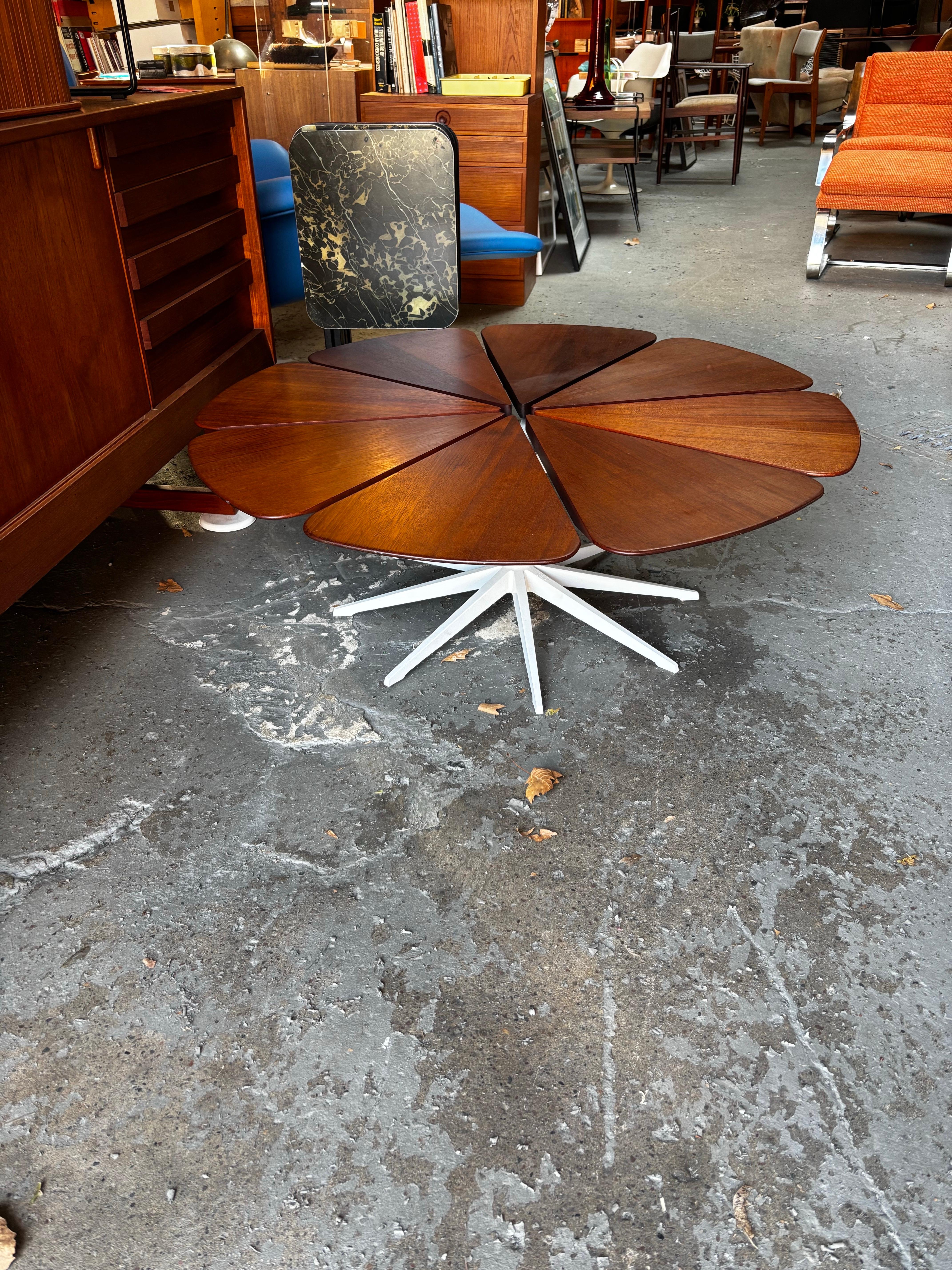 Richard Schultz for Knoll Teak Petal Table.  Nice early example that was restored 20 years ago and still looks great!  Looks like base was powder coated during its restoration.  Overall very clean with beautiful wood grain and tone!