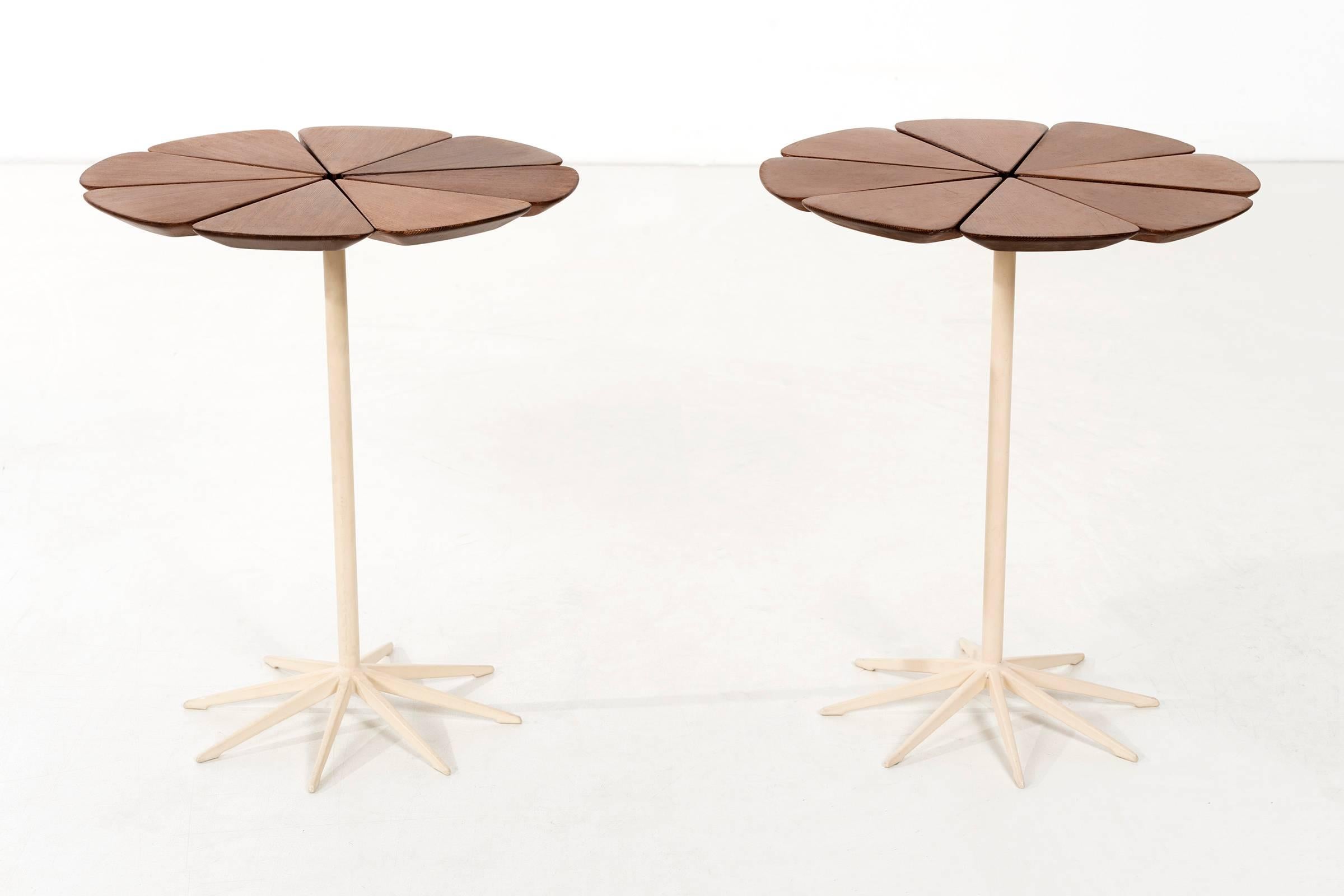 Schultz for Knoll indoor or outdoor tables, Schultz cites Queen Anne's Lace as his inspiration for these delicate tables with its flower-like top sprouting from the elegant pedestal base. Each redwood 