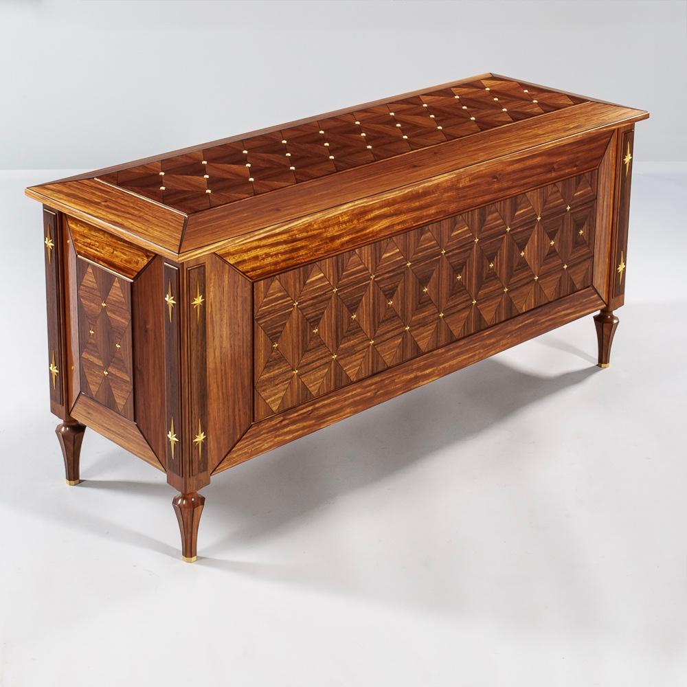A very fine quality American studio art furniture chest in white oak, ebony and gilt bronze by master artisan Richard Scott Newman, Rochester, New York, signed and dated 1994. The parquetry top, front, sides and back are decorated with gilt bronze