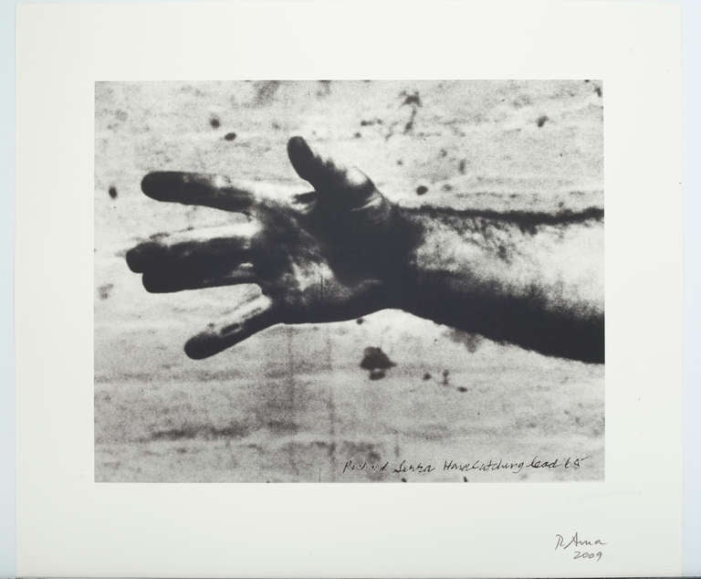 STILL FROM HAND CATCHING LEAD by Richard Serra (image of hand)