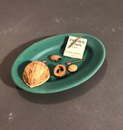 Green Oval Saucer with Matches and Nut