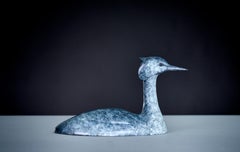 Contemporary Bronze sculpture of a Grebe swimming in water, bird, wildlife