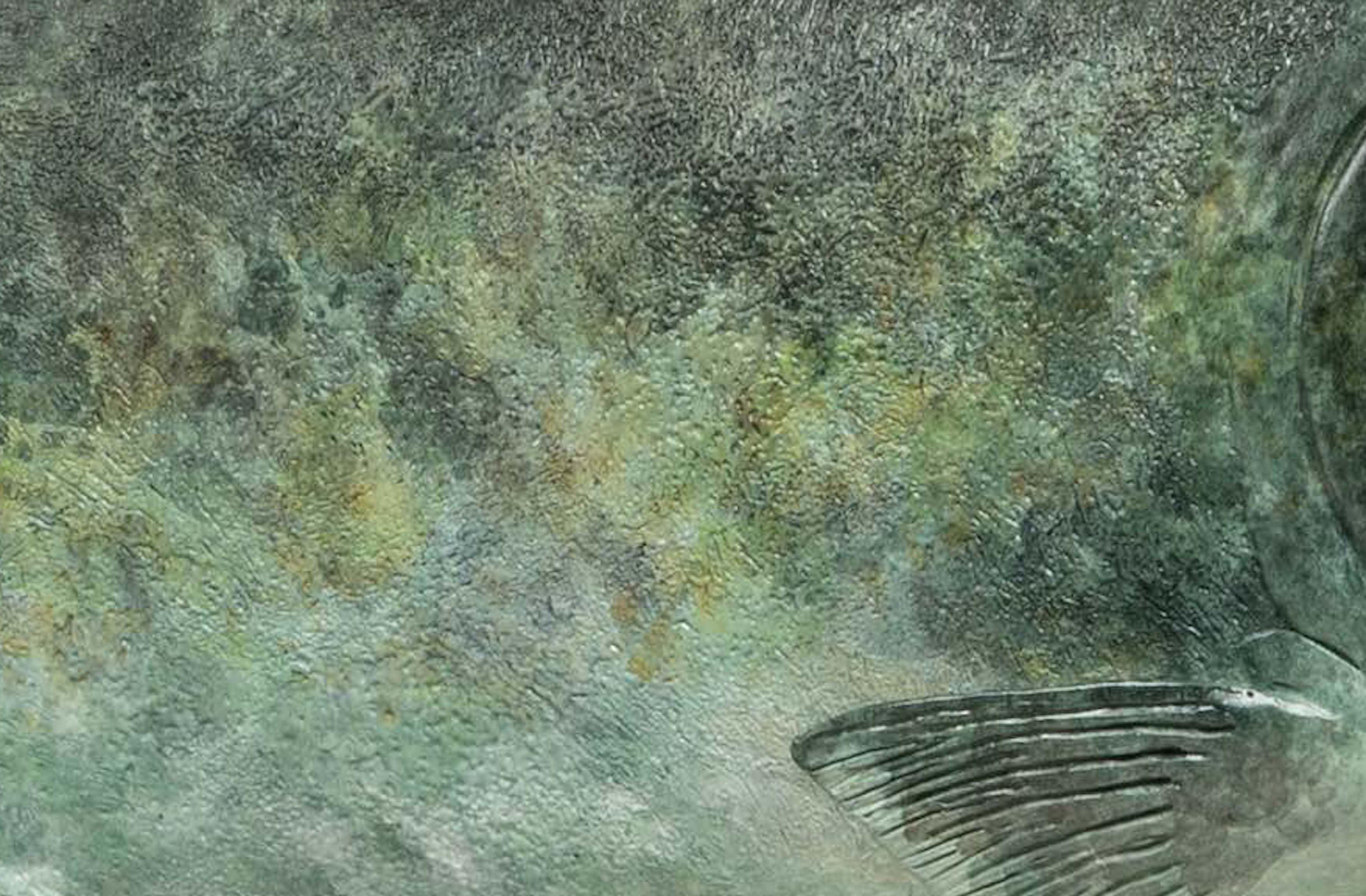 Edition of 18
A bronze sculpture titled 'Salmon' by Richard Smith, with a textured surface of mottled greens and hints of white, captures the dynamic vitality and sleek elegance of this iconic fish. The sculptor portrays the salmon in a moment of