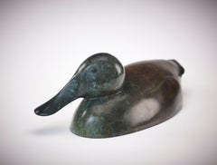 Contemporary Bronze Sculpture of a Shoveler Duck swimming, water bird, green