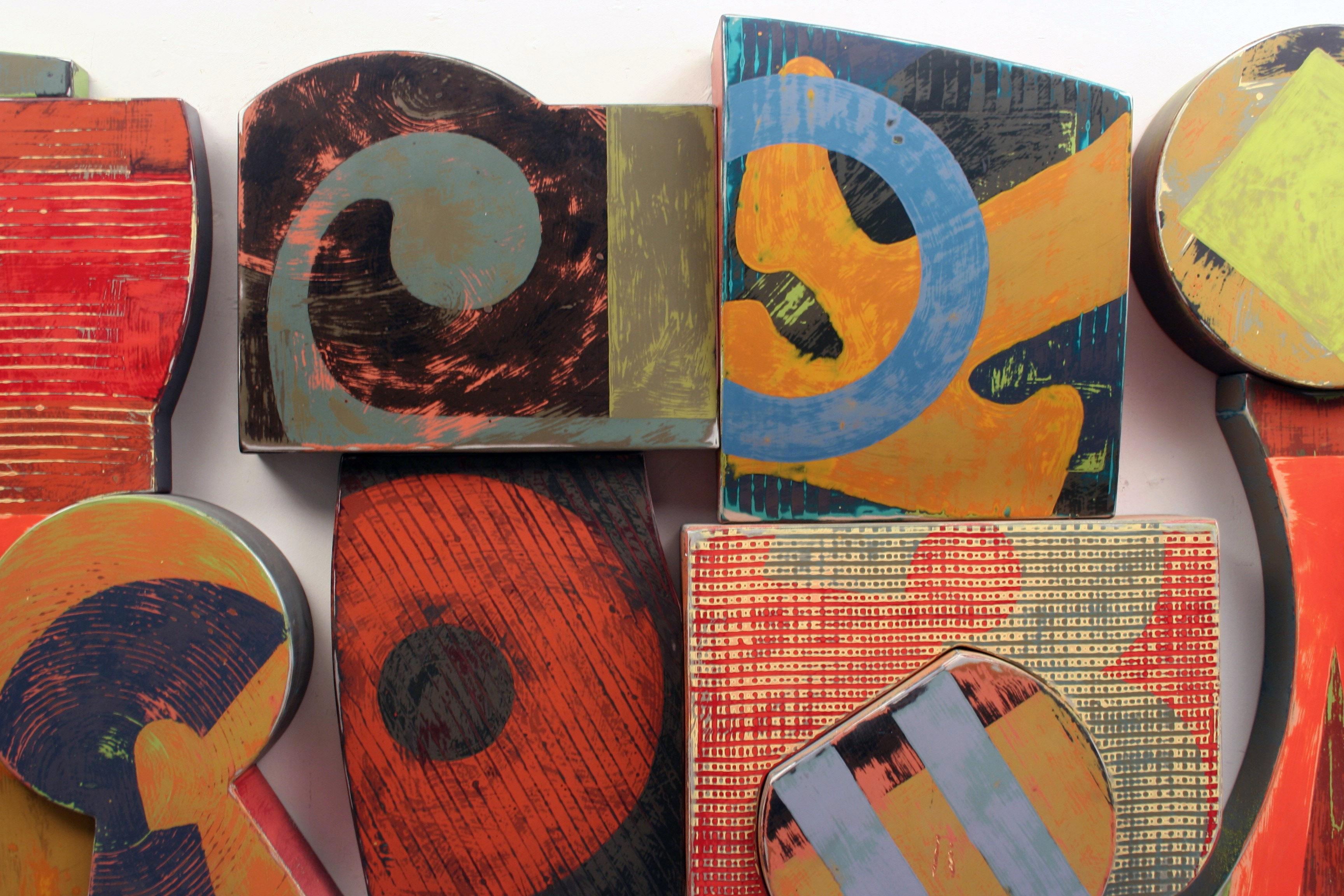 Campbell Apartment is a wall sculpture fabricated in welded aluminum and painted in enamel paints. It is comprised of five sections which give the appearance of one, unified piece when installed. I have created dozens of large wall sculptures of