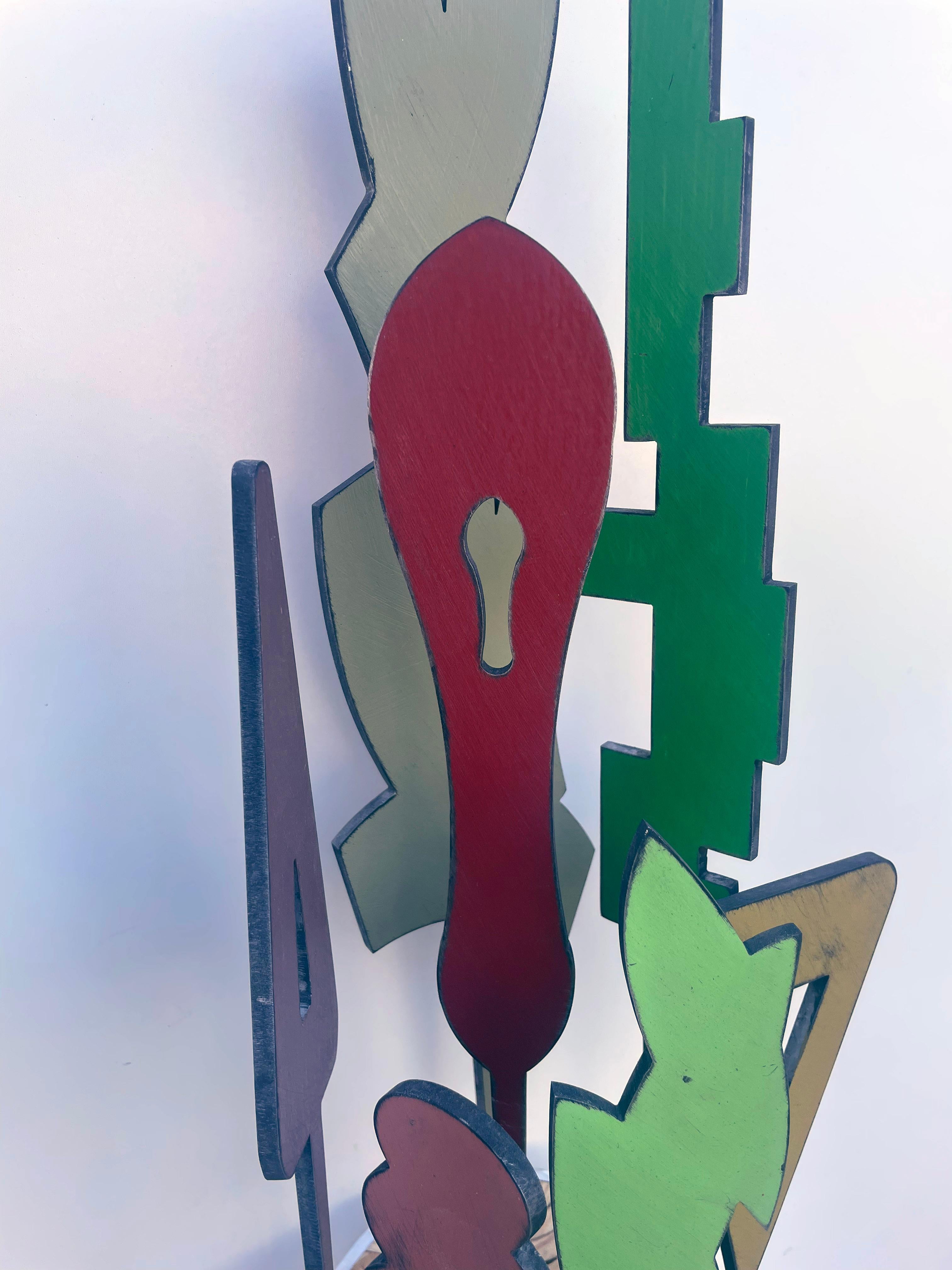 tabletop sculpture, indoor sculpture, wood and metal, colorful 