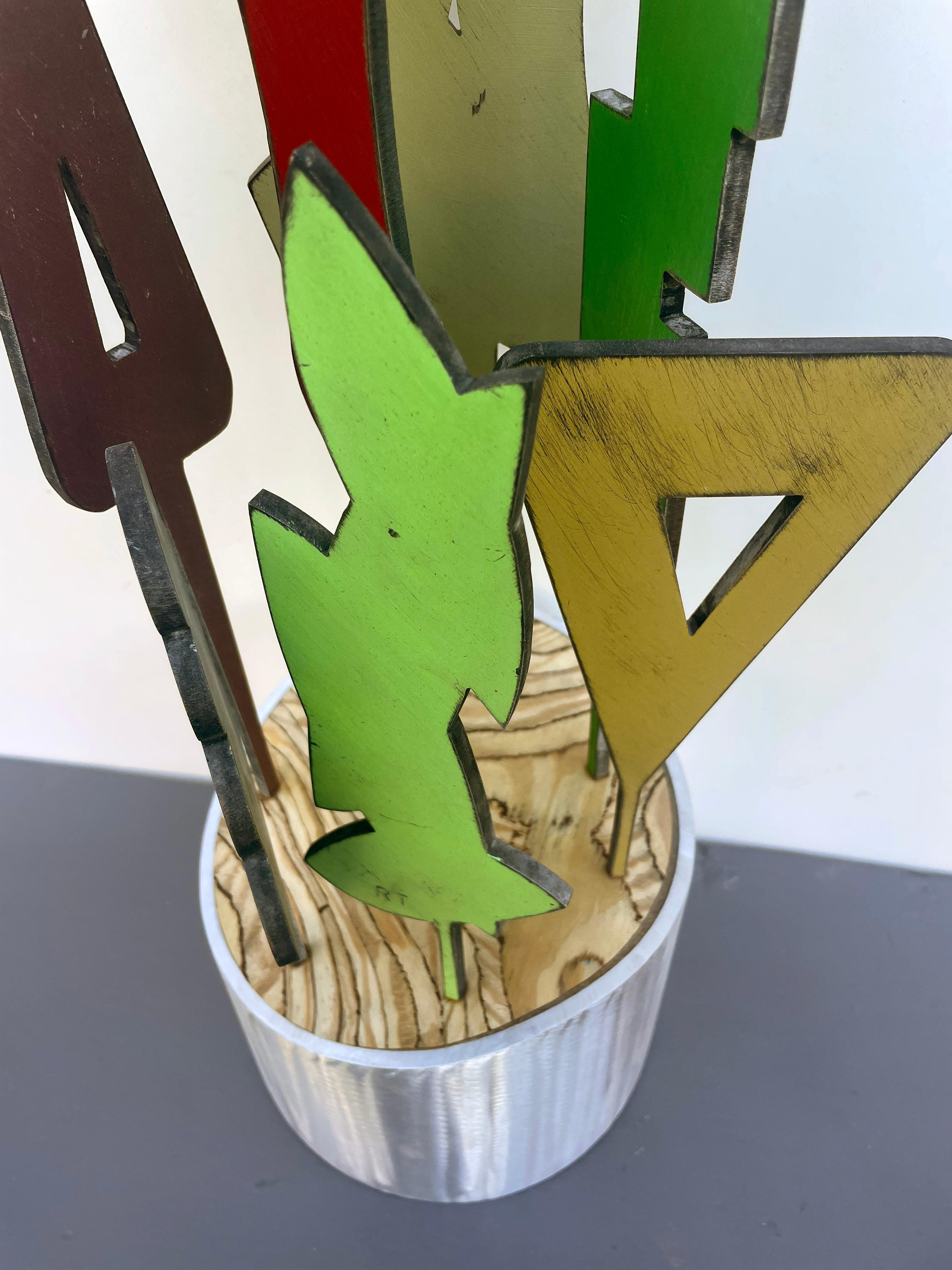 tabletop sculpture, indoor sculpture, wood and metal, colorful 