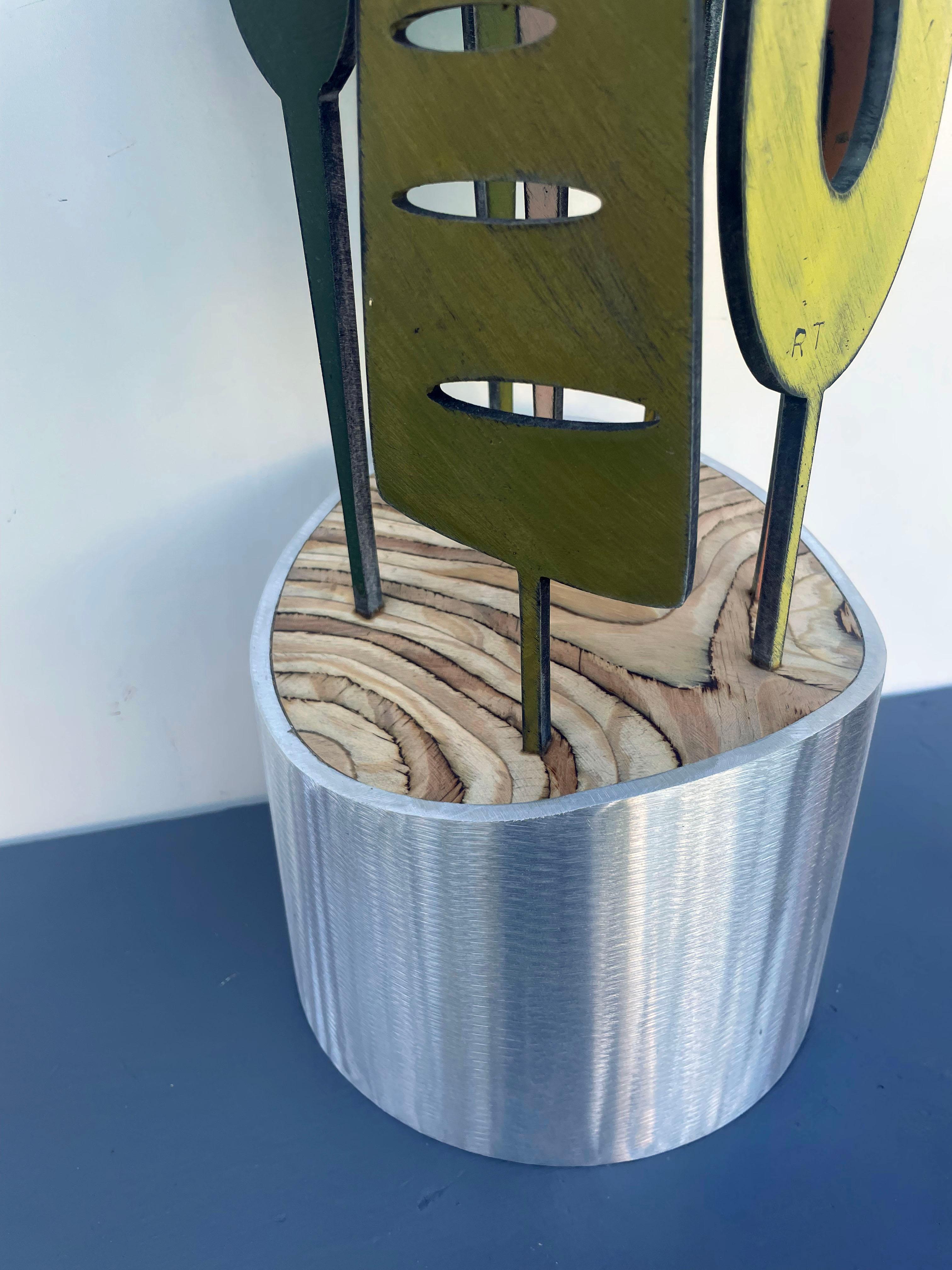 tabletop sculpture, indoor sculpture, wood and metal, colorful 