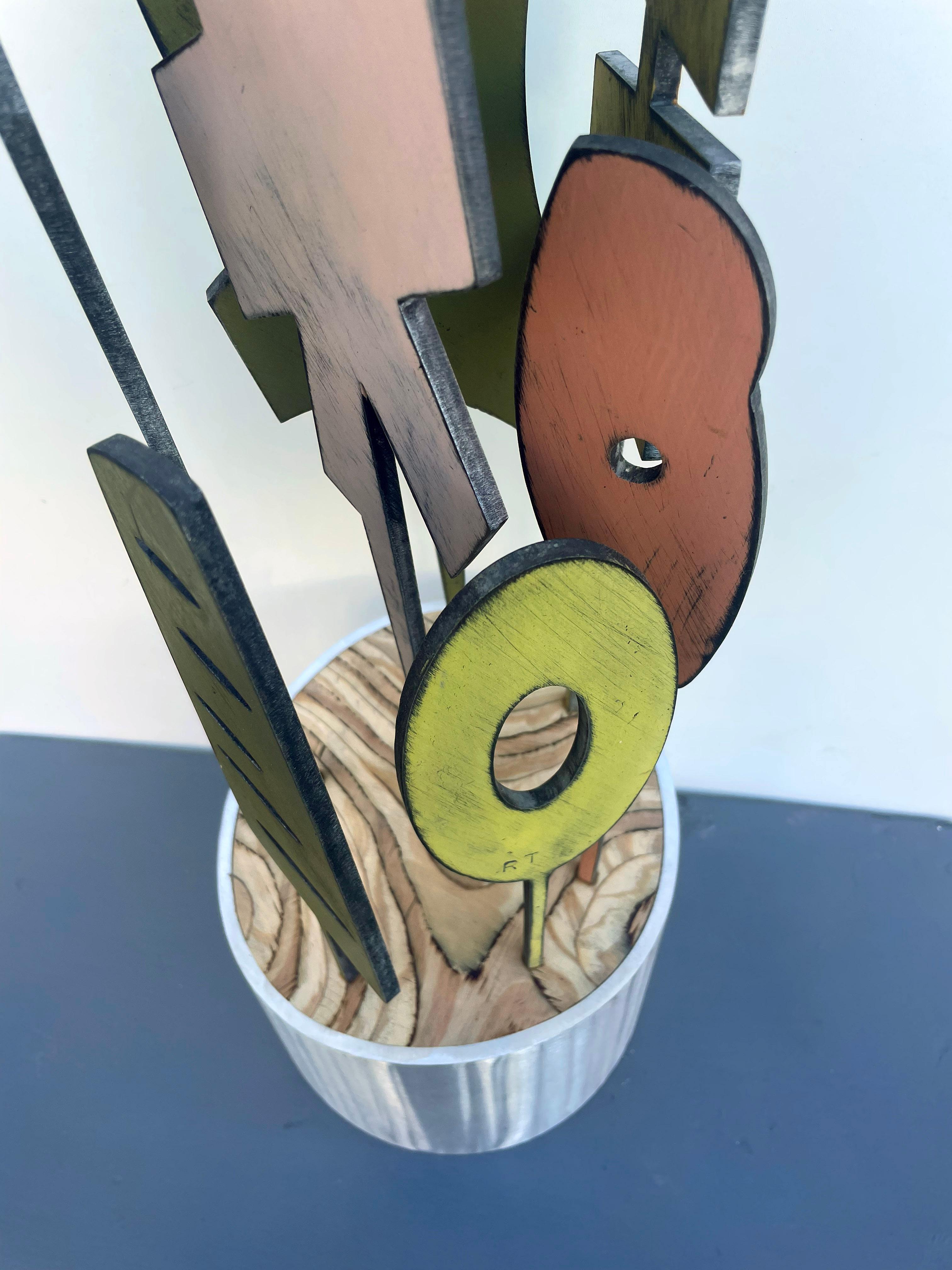 tabletop sculpture, indoor sculpture, wood and metal, colorful 