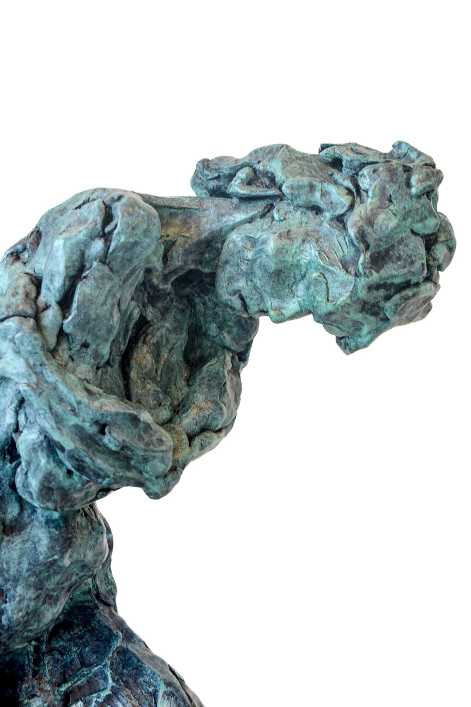 In this thoughtful sculpture by Canadian artist Richard Tosczak, the gestures of a female figure, head bent, arms wrapped, are captured in bronze. Known for his beautiful figurative work, this piece retains the artist’s signature highly textured