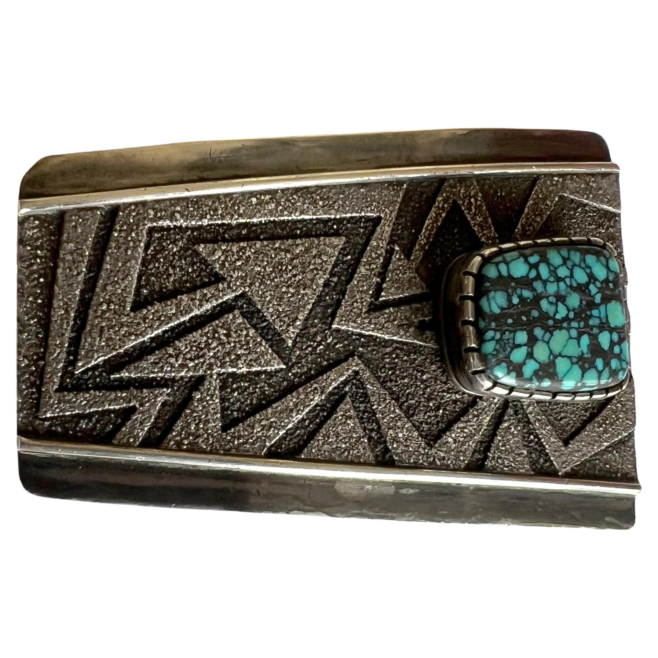 Tufa cast sterling silver with spiderweb turquoise stone created by Navajo jeweler Richard Tsosie. Buckle measures 2.25