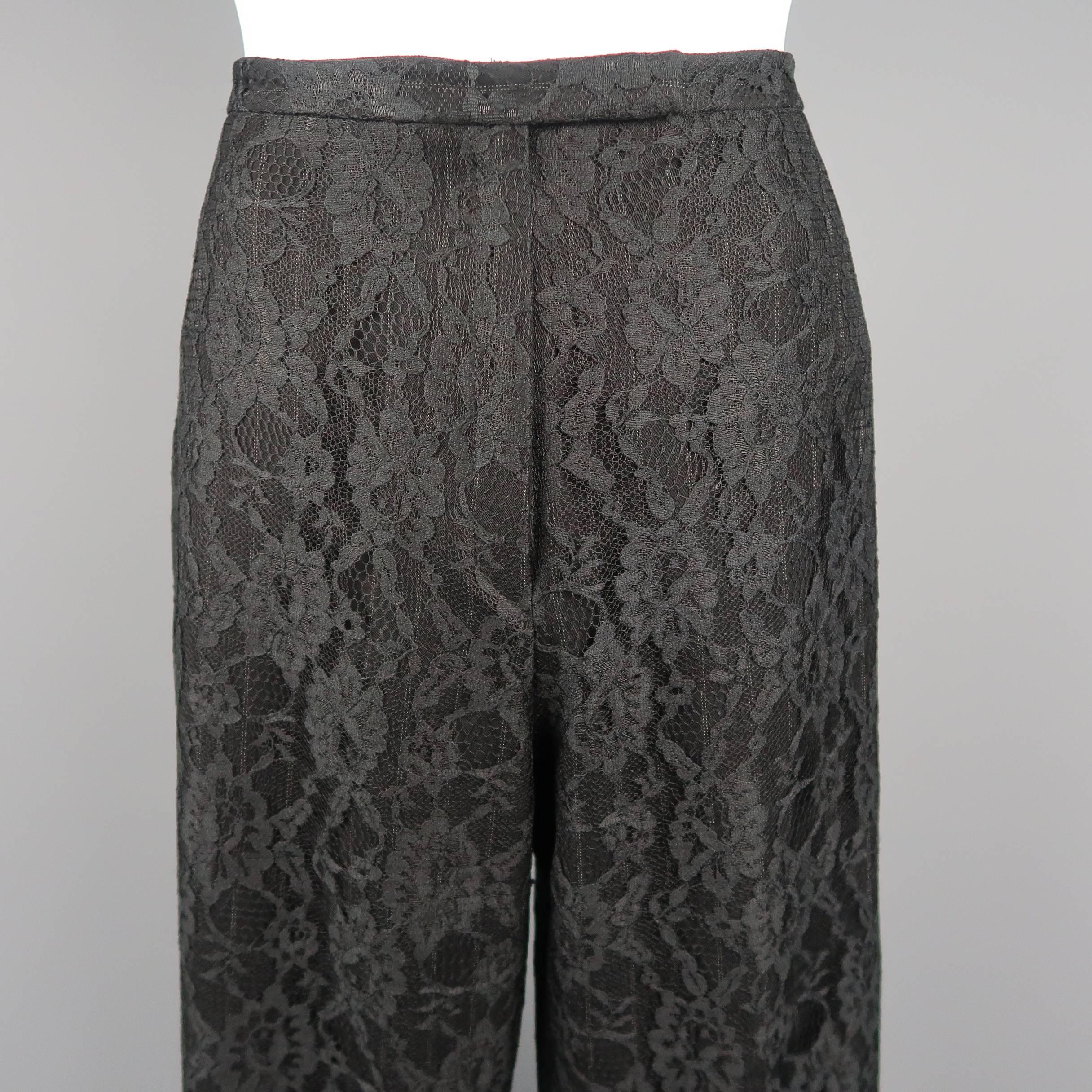 Archive RICHARD TYLER COUTURE high rise dress pants come in a black pinstripe wool blend fabric with floral lace overlay and tapered fit. Made in USA.
 
Excellent Pre-Owned Condition.
Marked: 10
 
Measurements:
 
Waist: 30 in.
Rise: 11 in.
Inseam: