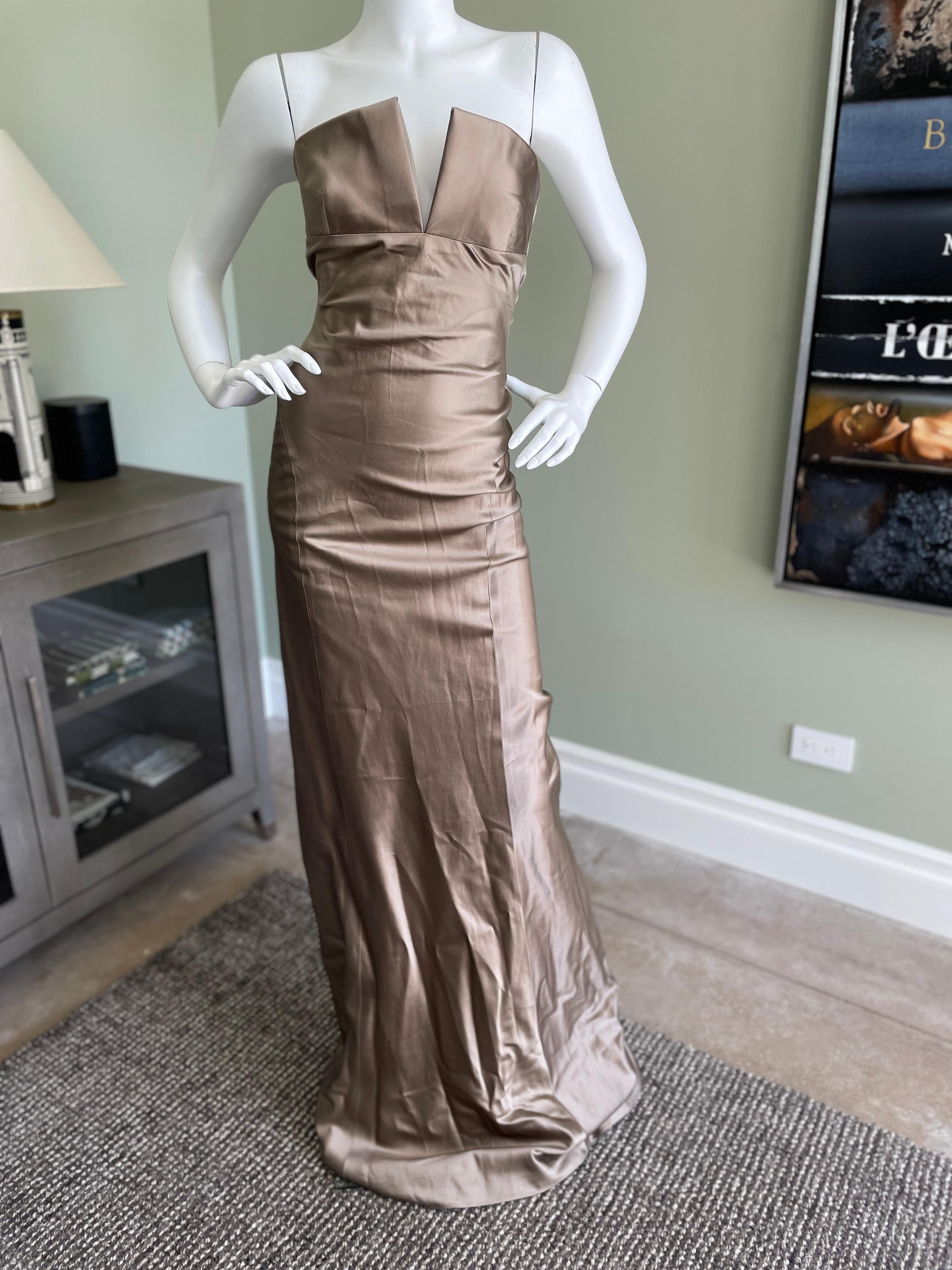 Richard Tyler Golden Metallic Silk Strapless Evening Dress
 This is so much prettier than the photos show.
Lined in silk, this pools along the floor.
Size 6
 Bust 32