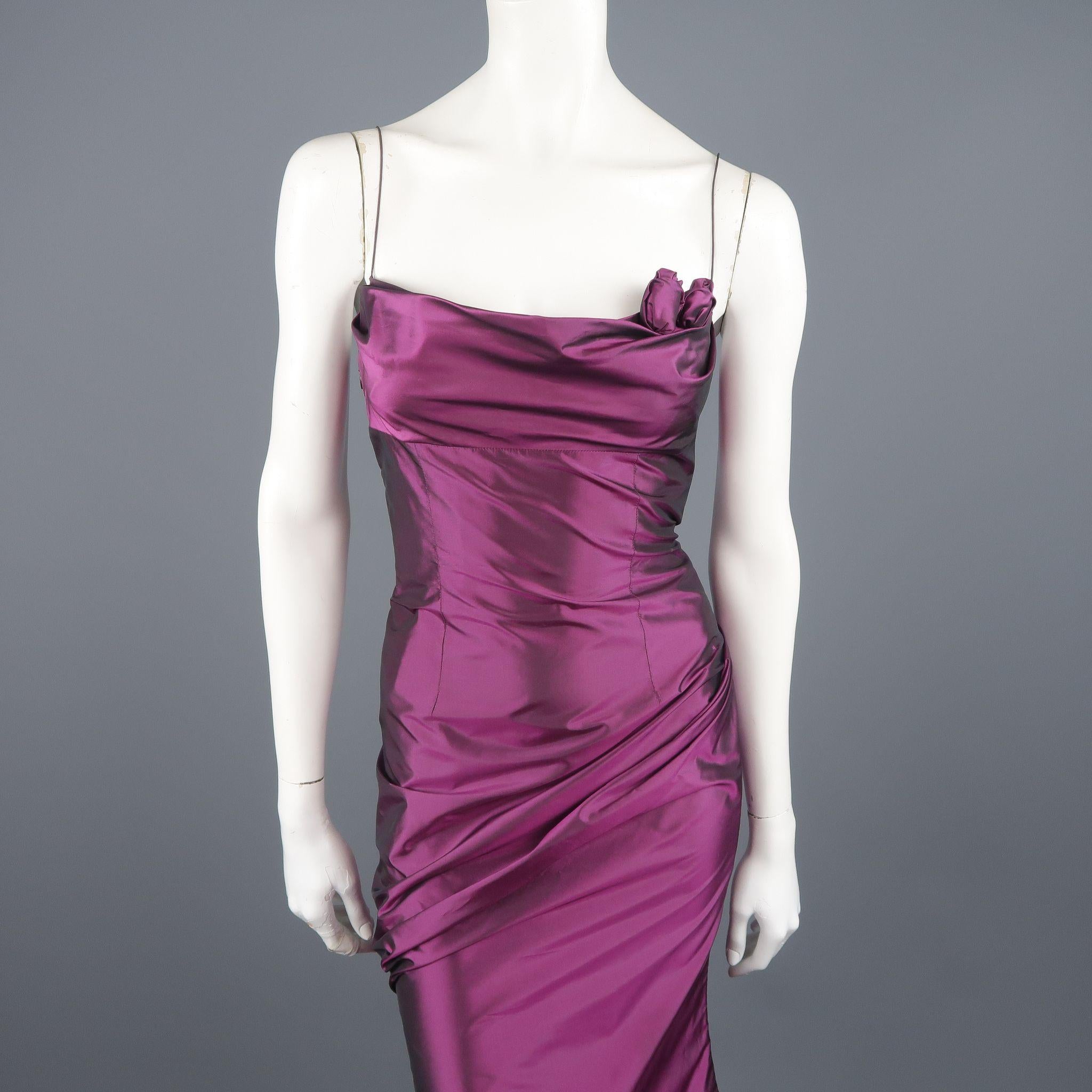 Vintage RICHARD TYLER COUTURE evening gown comes in fuchsia purple iridescent silk taffeta and features a gathered bust line, fitted body with draped side, spaghetti straps, and rosette applique details. Minor wear and marks under arms. Made in the