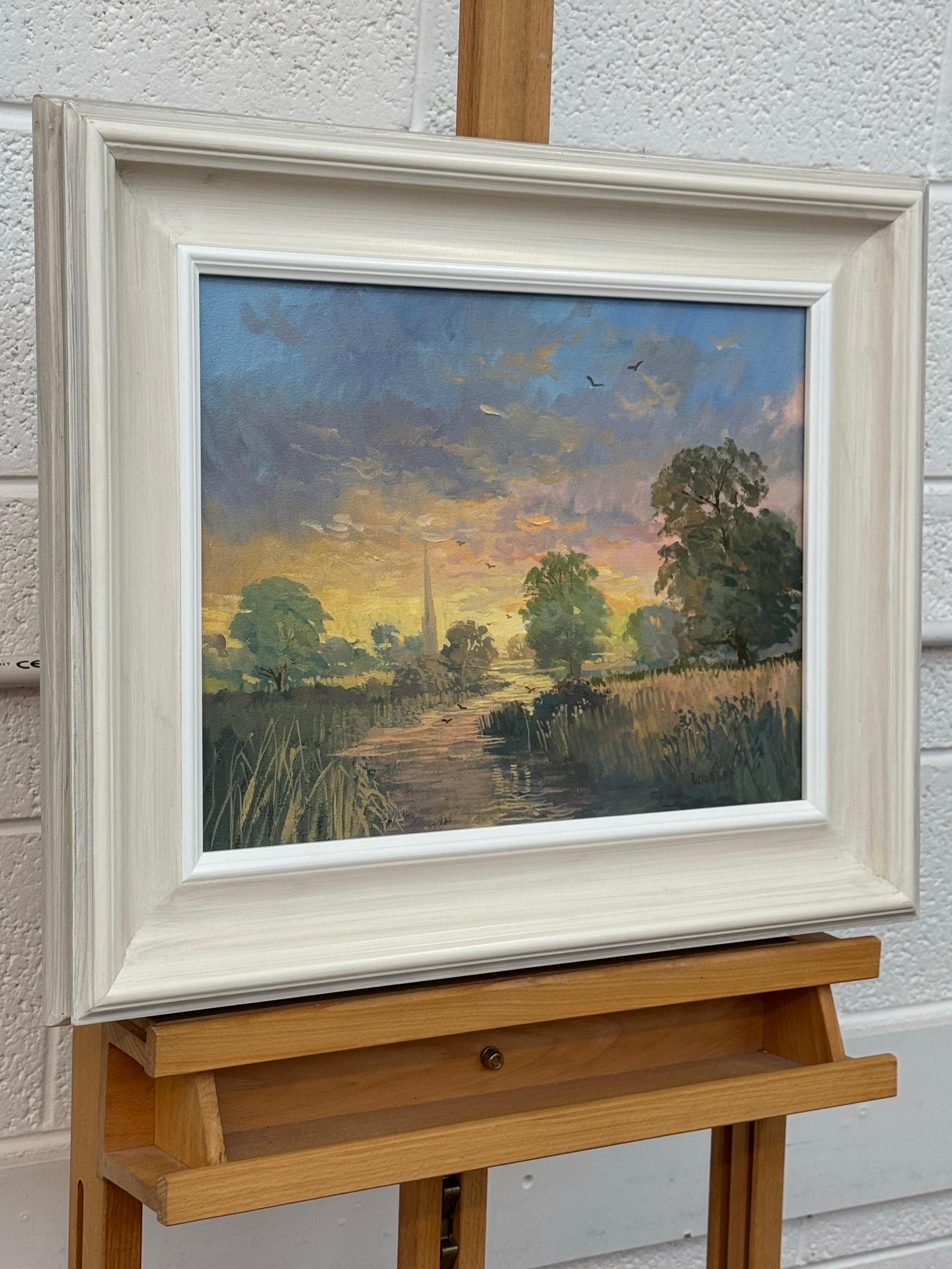 Amanecer en un pueblo junto al río en la campiña inglesa con la aguja de una iglesia y pájaros - Painting de Richard Wood