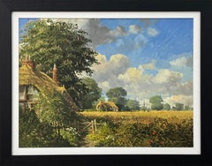 Thatched Cottages with Wild Flowers & Village Church in the English Countryside
