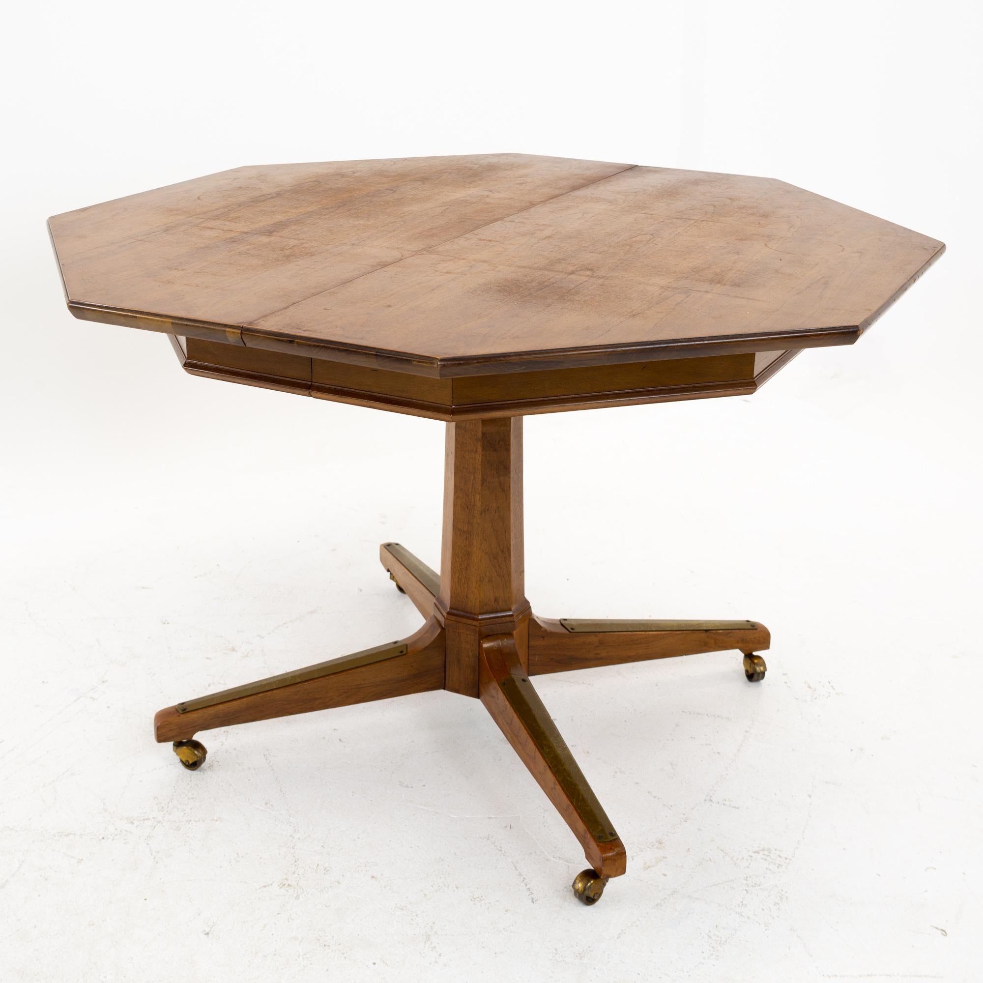 Richardson midcentury walnut octagonal dining table
Measures: 58.5 wide x 41.5 deep x 29 inches high

All pieces of furniture can be had in what we call restored vintage condition. That means the piece is restored upon purchase so it’s free of