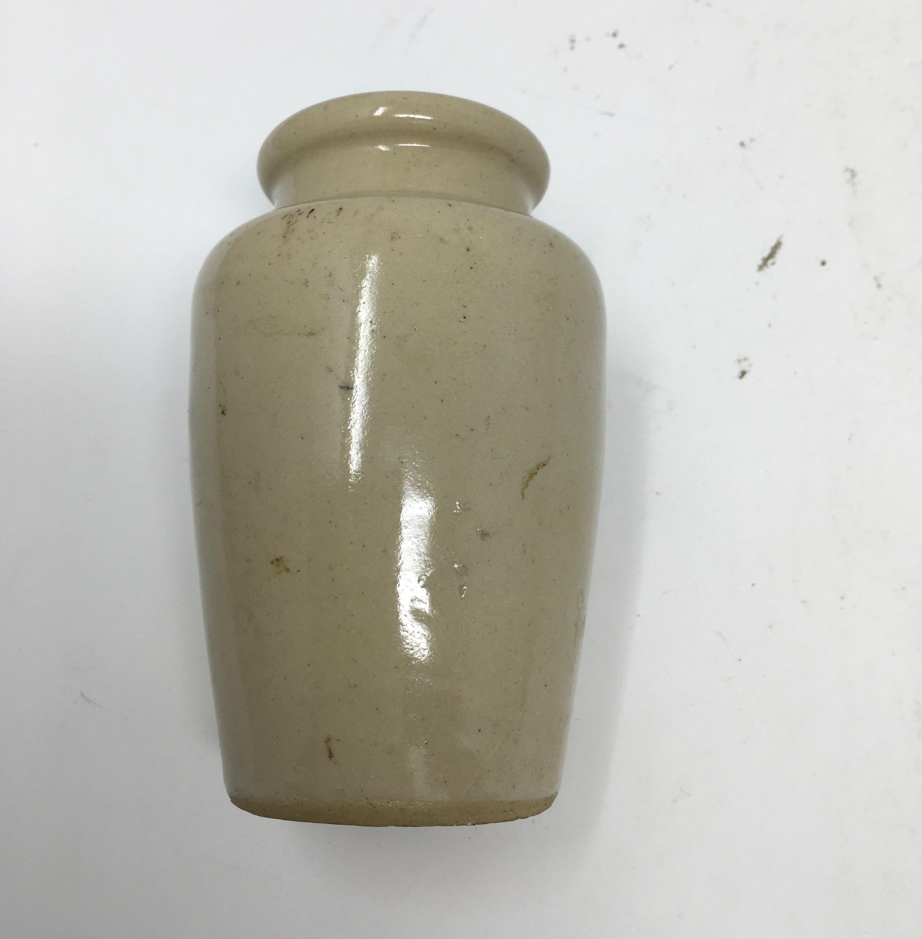 Found in England, this vintage Richardson's thick cream ironstone advertising jar from Sheffield is in good clean condition. The decorative pot that once held cream has transfer on the front in black lettering under the glaze and a picture of a cow