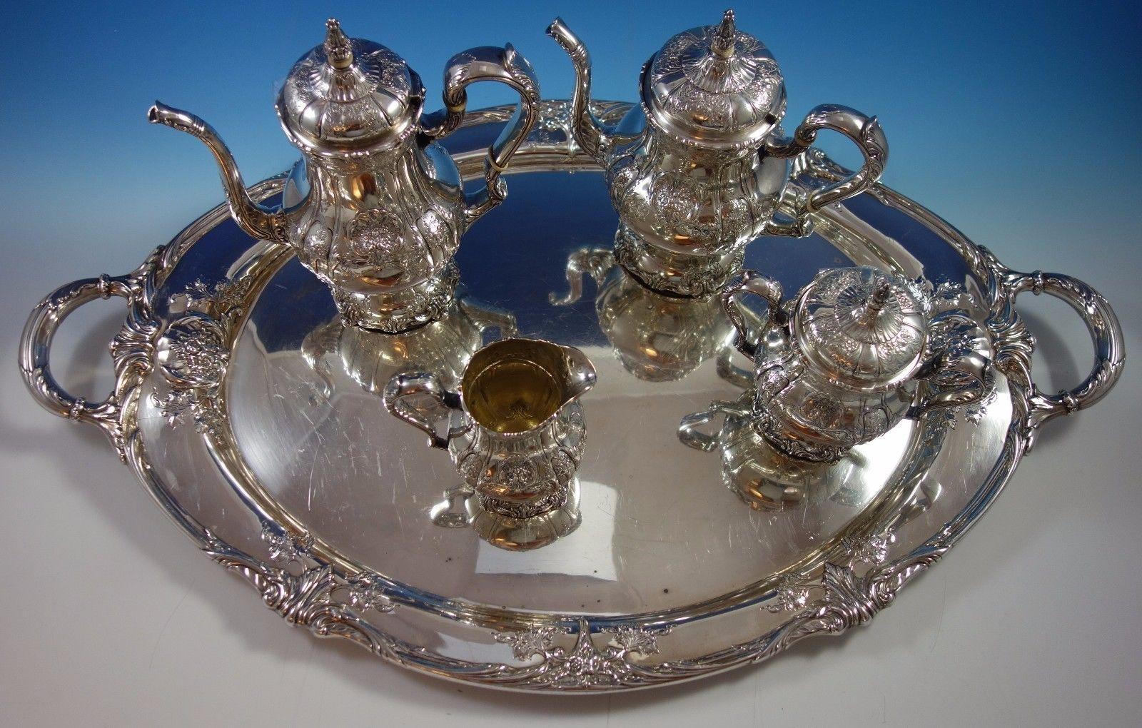 Gorgeous Richelieu by International four-piece sterling silver tea set with sterling silver tray. This set includes: 

One tray: Measures 32 1/2