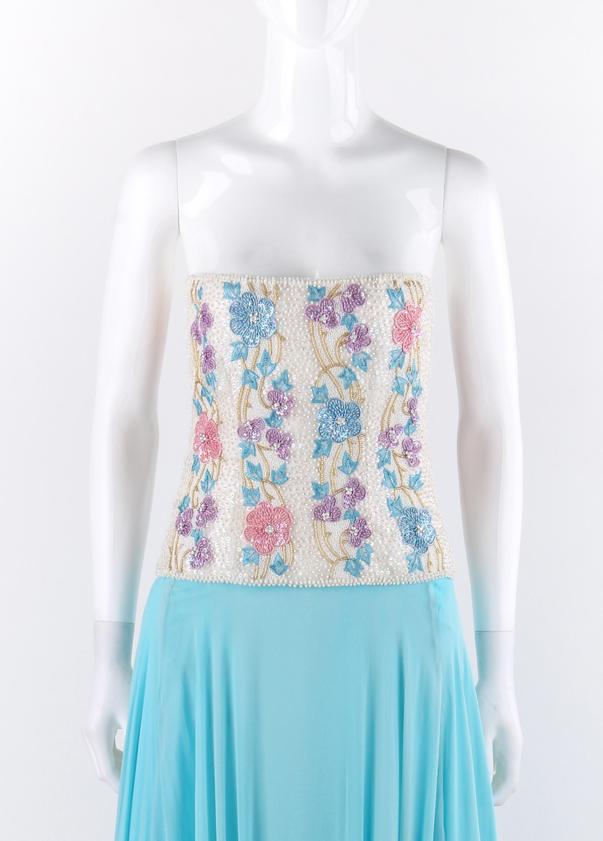 RICHILENE c.1980's Blue Silk Chiffon Floral Bead Embroidery Strapless Dress Gown
 
Circa: 1980’s
Label(s): Richilene New York
Designer: Ilene Pacun & Richard Pacun
Style: Strapless gown
Color(s): Shades of blue, beige, purple, pink, yellow