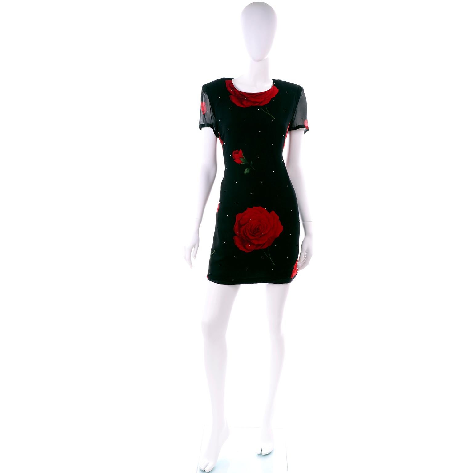 This is a vintage Richilene New York fully lined silk shift dress with sheer silk chiffon sleeves and tiny rhinestones. The dress is black with red roses and green leaves and it's a super easy to wear dress for a dinner party, cocktail party, or