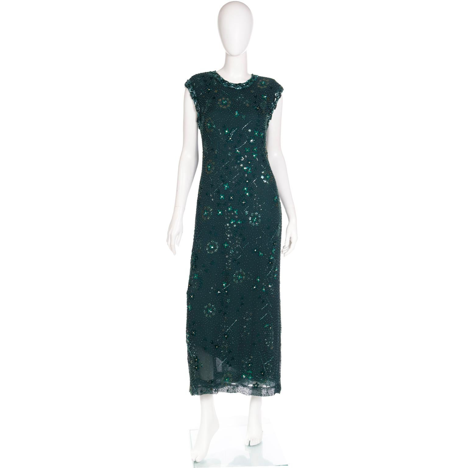 This rich, deep green vintage Richilene evening gown is covered in finely embroidered beads and sparkling sequins and it comes with a matching silk beaded shawl or wrap. This lovely vintage long sheath dress is in a fine silk crepe and is fully